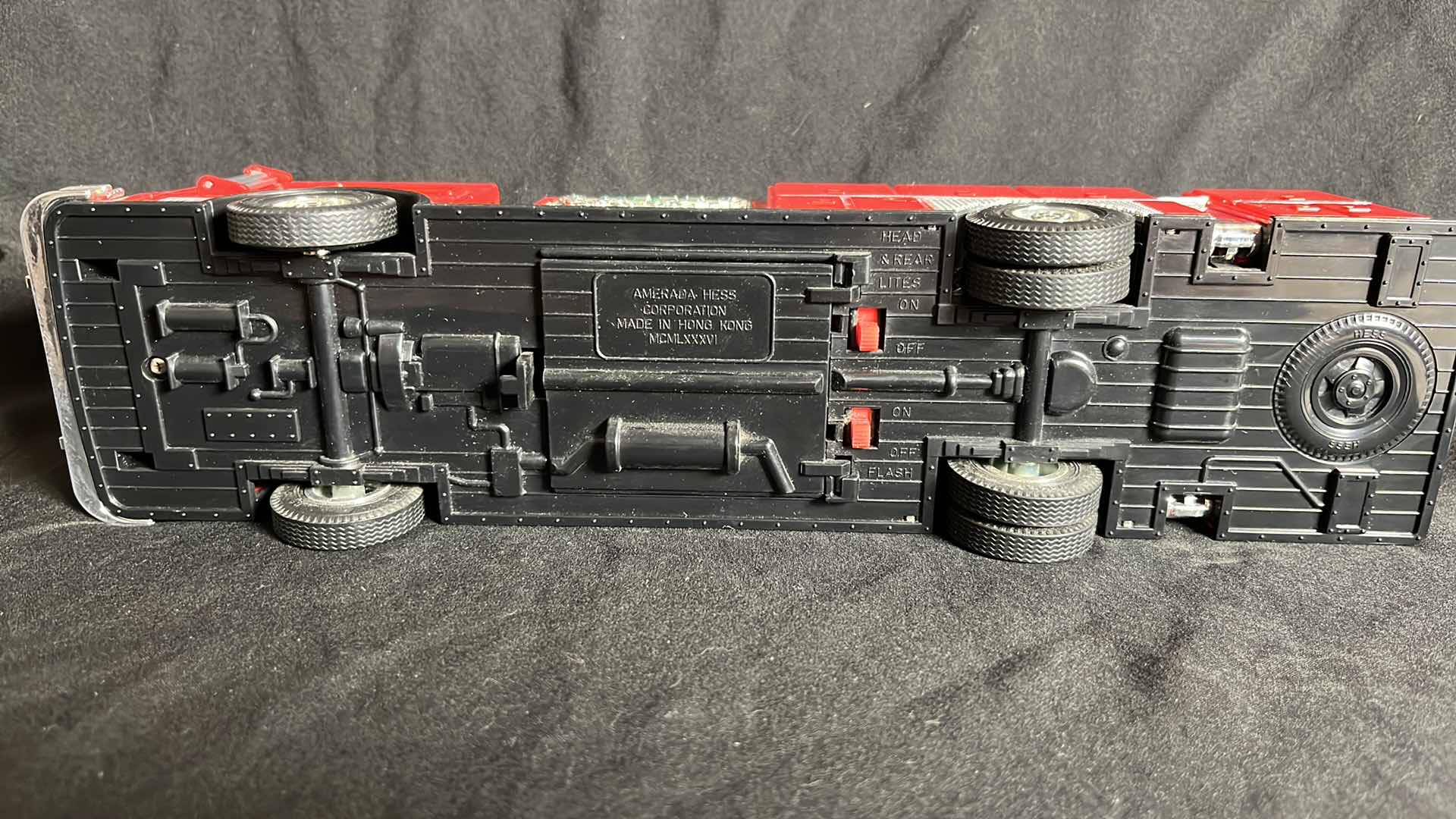 Photo 1 of HESS RED FIRE TRUCK BANK W AERIAL LADDER & ENGINE, BATTERY OPERATED, 1986, NO BOX