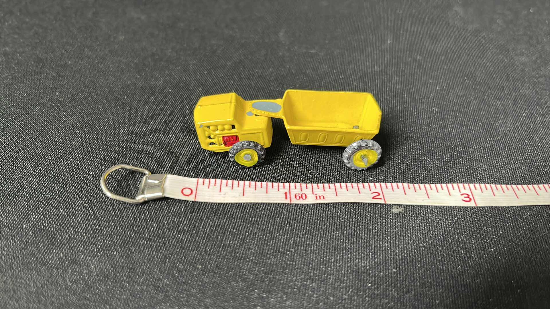 Photo 1 of LINEMAR TOYS ELEGANT MINIATURES 2” HOPPER DUMP TRUCK (No. 5)