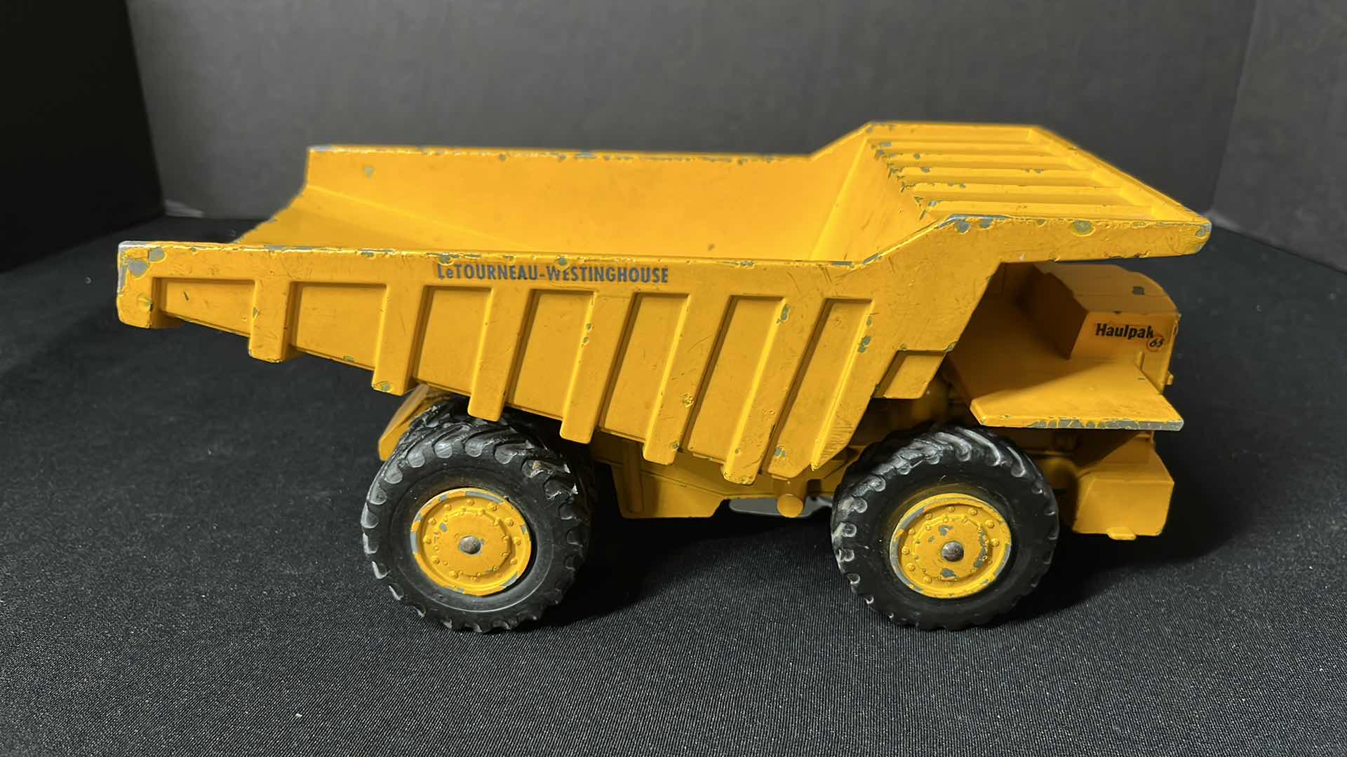 Photo 1 of ERTL COMPANY VINTAGE DIE-CAST METAL WABCO HAULPAK LETOURNEAU WESTINGHOUSE DUMP TRUCK TOY, CIRCA 1960’S, 4.75” X 10.25” H4.25”
