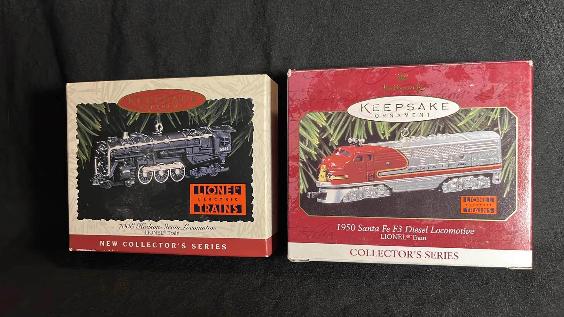 View 1 of HALLMARK LIONEL TRAIN DIE-CAST METAL KEEPSAKE ORNAMENTS 700E HUDSON STEAM LOCOMOTIVE 1996 (#QX5531) & 1950 SANTA FE F3 DIESEL LOCOMOTIVE 1997 (QX6145)