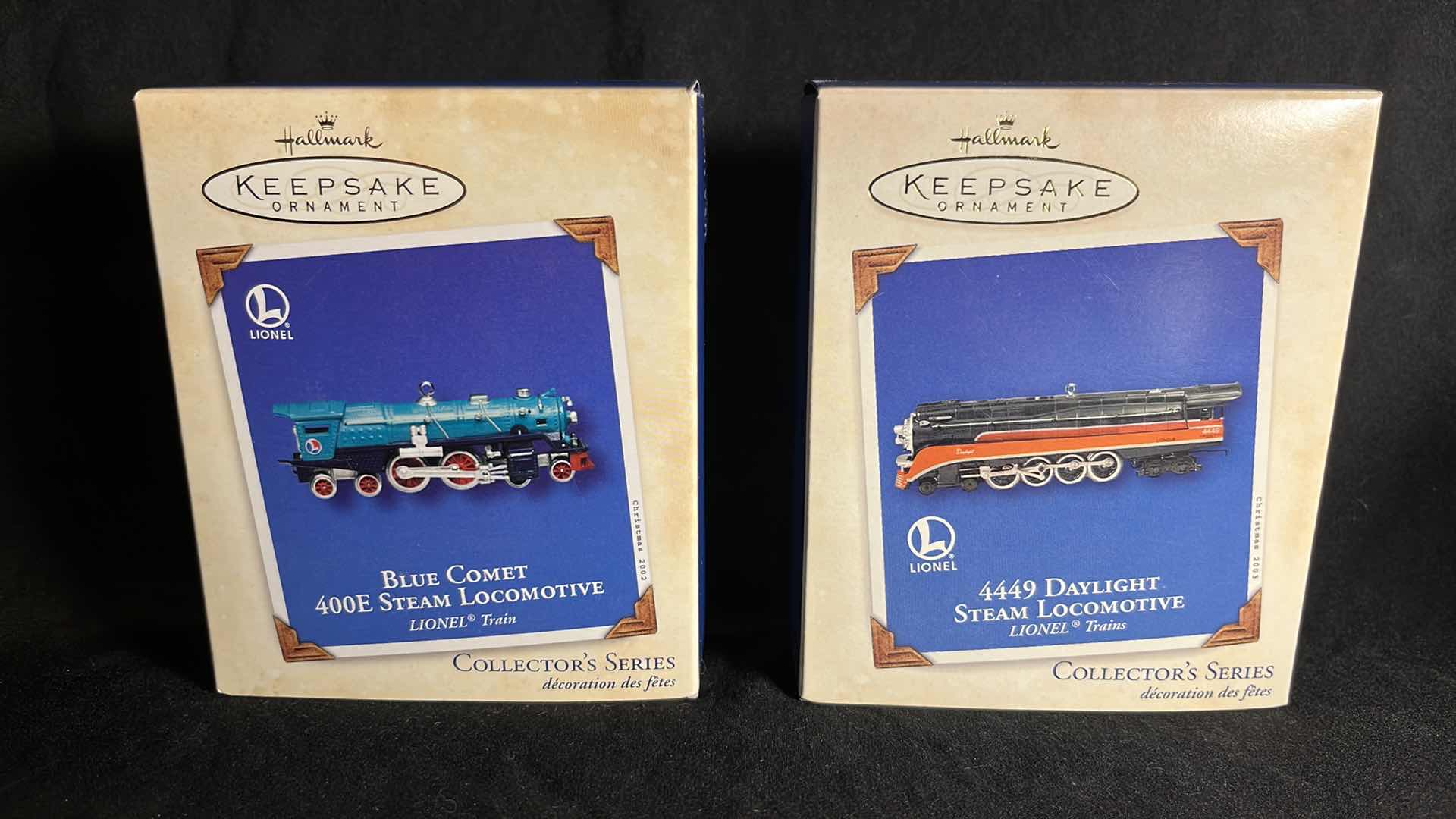 View 1 of HALLMARK LIONEL TRAIN DIE-CAST METAL KEEPSAKE ORNAMENTS BLUE COMET 400E STEAM LOCOMOTIVE 2002 (#QX8166) & 4449 DAYLIGHT STEAM LOCOMOTIVE 2003 (#QX8087)