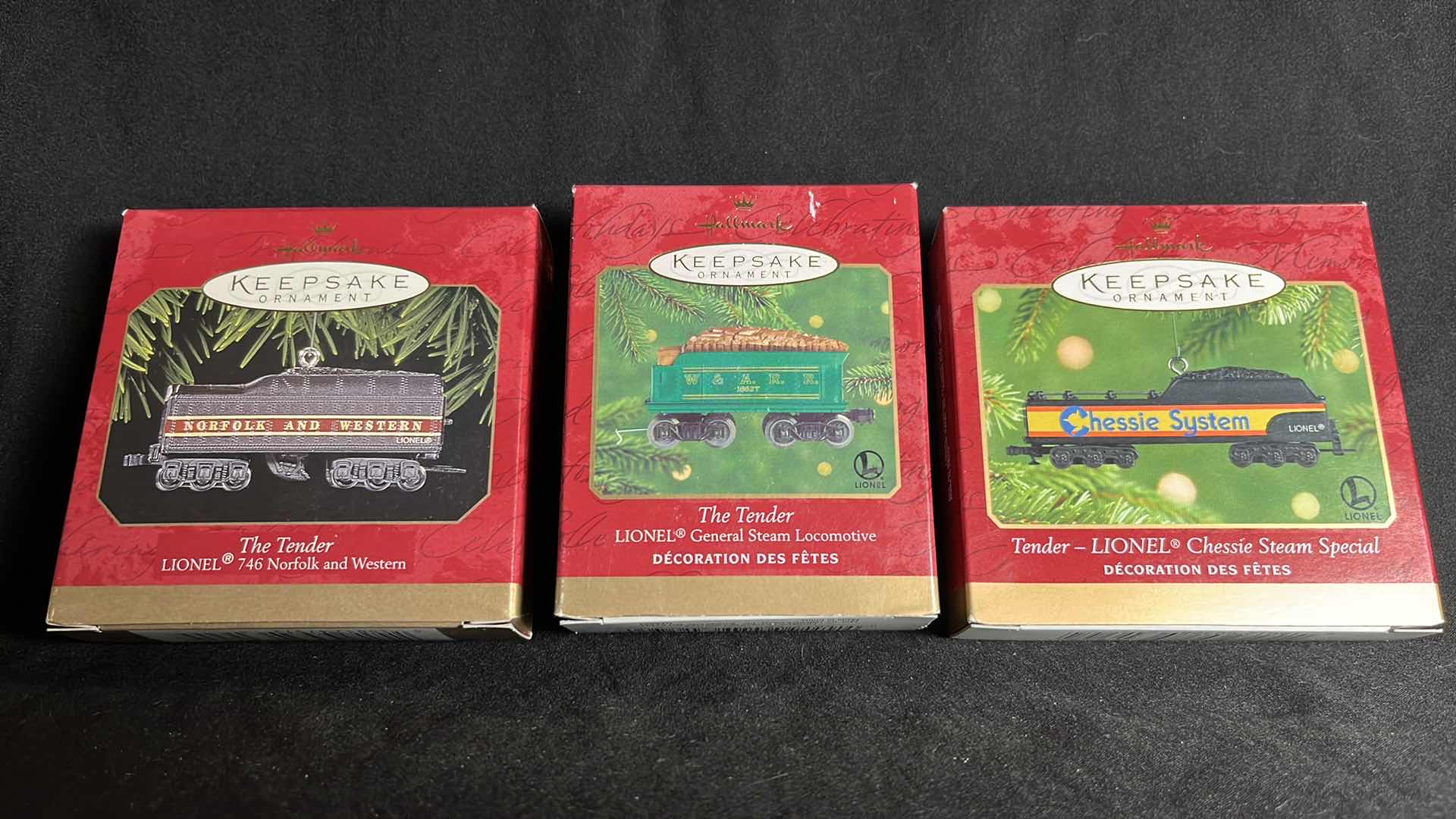 View 1 of HALLMARK LIONEL TRAIN DIE-CAST METAL KEEPSAKE ORNAMENTS THE TENDER 746 NORFOLK AND WESTERN 1999 (#QX6497), THE TENDER GENERAL STEAM LOCOMOTIVE 2000 (#QX6834) & TENDER CHESSIE STEAM SPECIAL 2001 (#QX6285)