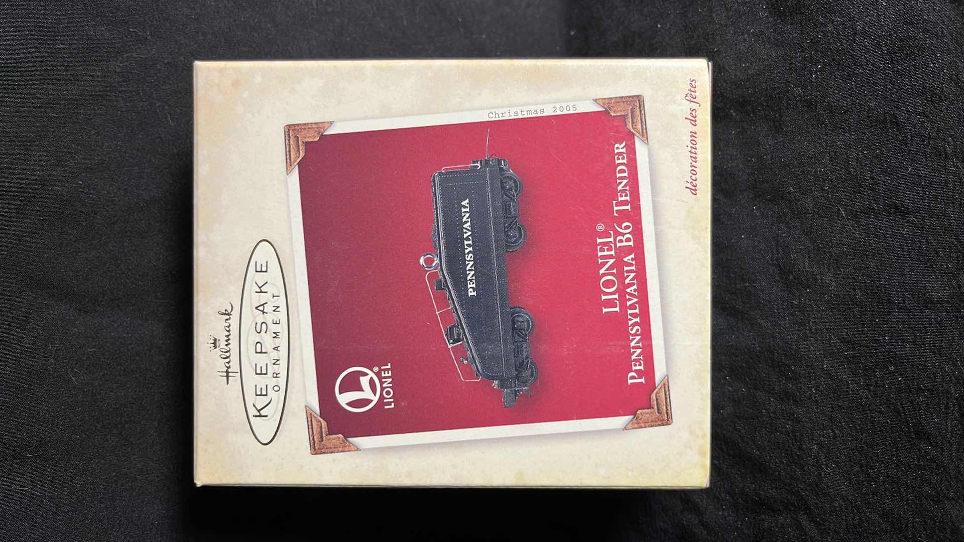 View 5 of HALLMARK LIONEL TRAIN DIE-CAST METAL & HANDCRAFTED KEEPSAKE ORNAMENTS BLUE COMET 400T OIL TENDER 2002 (#QX8243), PENNSYLVANIA B6 TENDER 2005 (#QXI6122) & NO. 714 BOXCAR 2005 (#QXI6125)