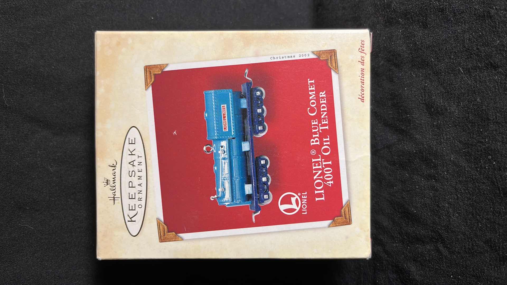 View 2 of HALLMARK LIONEL TRAIN DIE-CAST METAL & HANDCRAFTED KEEPSAKE ORNAMENTS BLUE COMET 400T OIL TENDER 2002 (#QX8243), PENNSYLVANIA B6 TENDER 2005 (#QXI6122) & NO. 714 BOXCAR 2005 (#QXI6125)