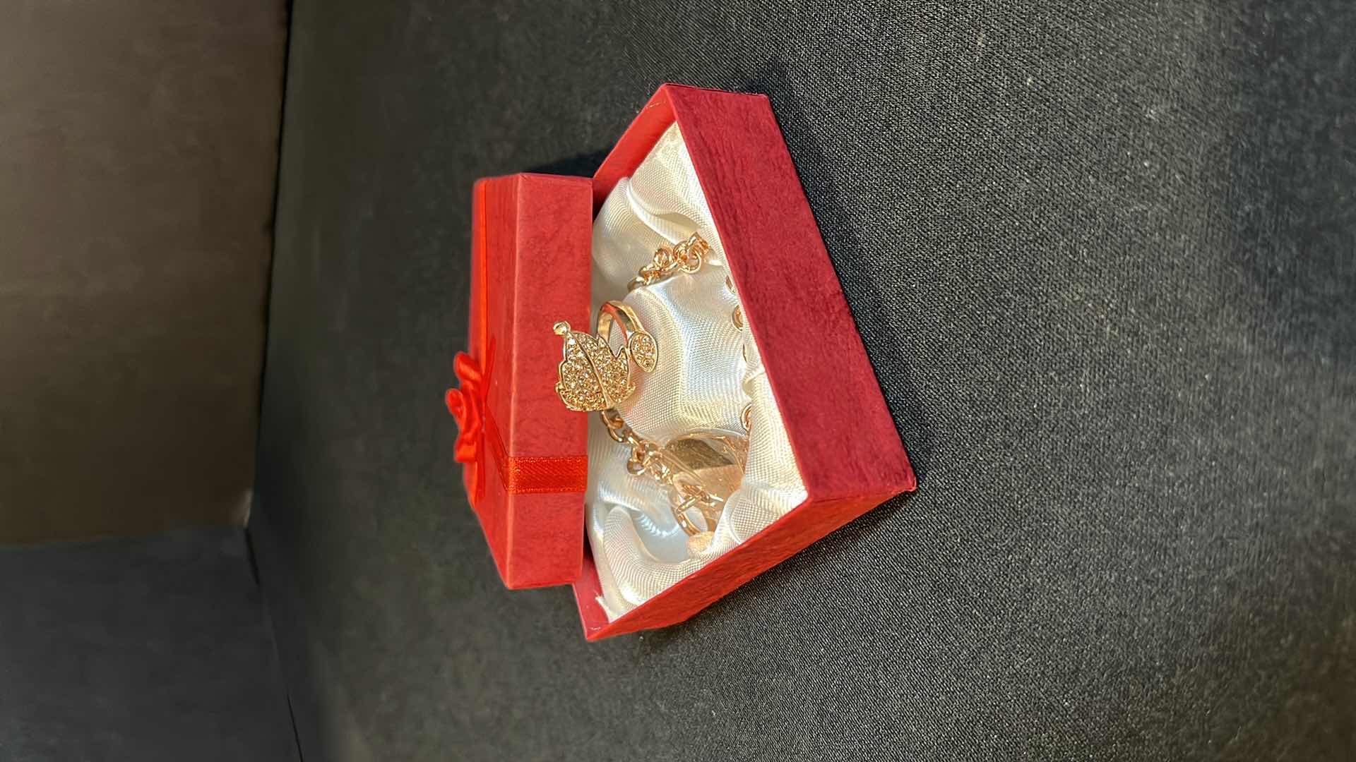 Photo 1 of ROSE GOLD CHAIN BRACELET AND LEAF RING FAUX