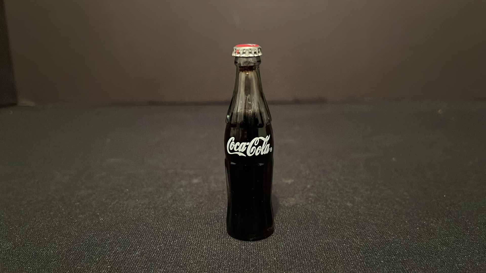 Photo 1 of COCA-COLA COLLECTIBLE MINI CLOCK ICE CHEST W COKE BOTTLE CASES 4”H, 2000 & COCA-COLA COLLECTIBLE GEORGETOWN MINI GLASS BOTTLE 3”H