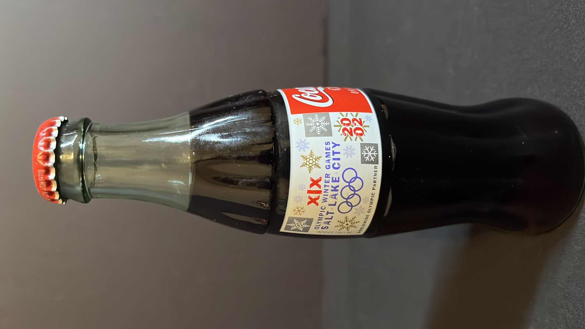 Photo 1 of COCA-COLA 3-COMMEMORATIVE OLYMPICS 8 OZ BOTTLES, ATLANTA 1996 OLYMPICS, ATLANTA 1996 TORCH RELAY & SALT LAKE CITY 2002, UNOPENED