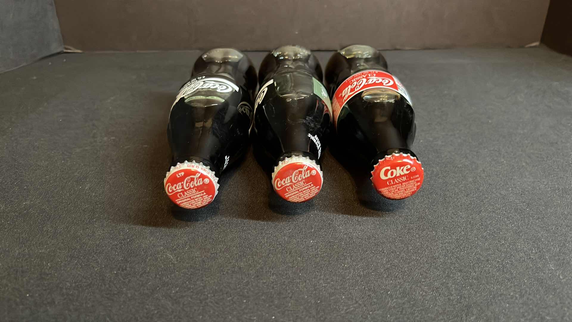 Photo 1 of COCA-COLA 3-COMMEMORATIVE OLYMPICS 8 OZ BOTTLES, ATLANTA 1996 OLYMPICS, ATLANTA 1996 TORCH RELAY & SALT LAKE CITY 2002, UNOPENED