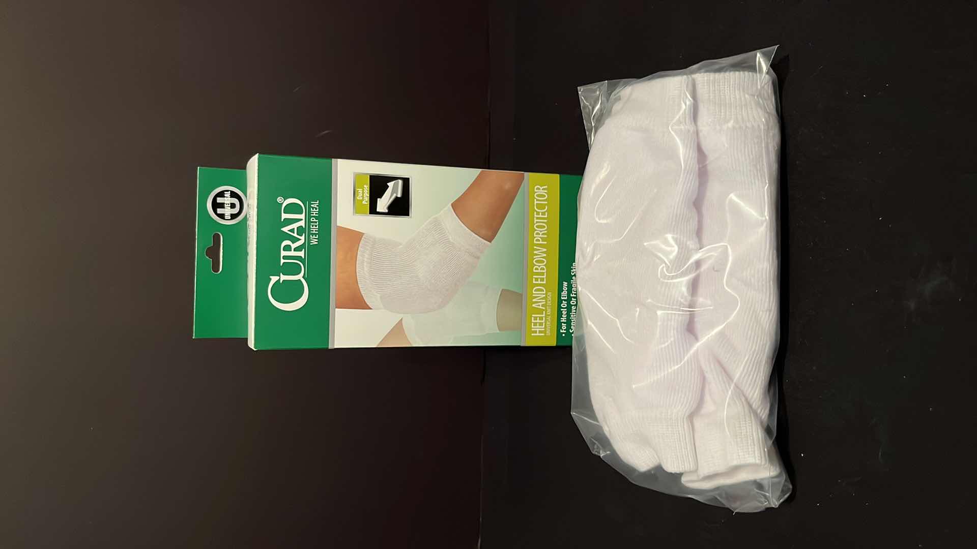Photo 1 of NIP ESSENTIAL MEDICAL SUPPLY FIBER FILLED HEEL PROTECTOR, ONE PAIR (ITEM D6000) & NIP CURAD HEAL/ELBOW PROTECTOR, ONE PAIR