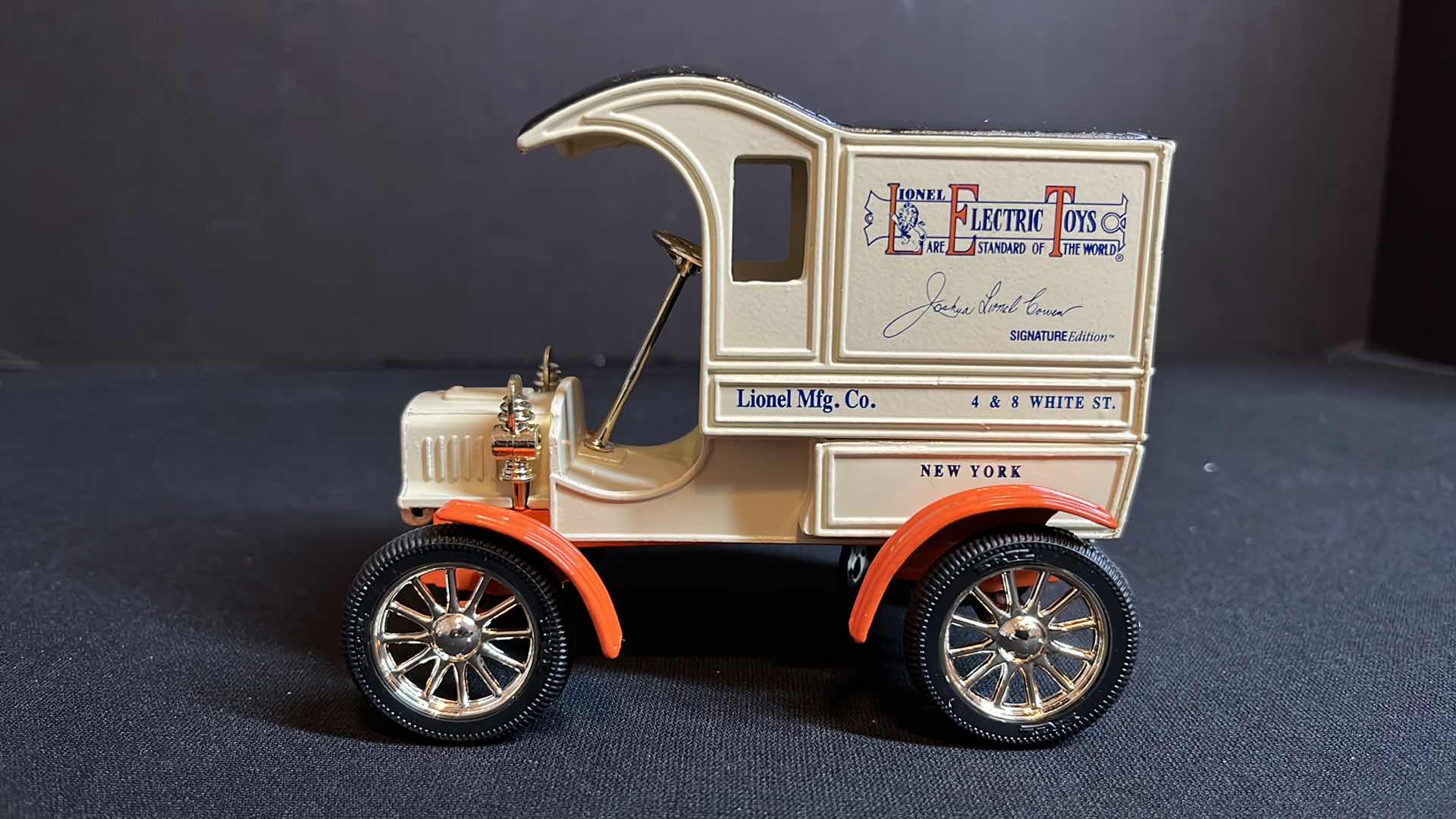 Photo 1 of ERTL COMPANY EASTWOOD AUTOMOBILIA LIONEL ELECTRIC TRAINS DIE-CAST METAL SIGNATURE EDITION 1905 FORD DELIVERY TRUCK BANK W KEY & 1950 CHEVY TRACTOR TRAILER W COA, 1994 (STOCK #B557)