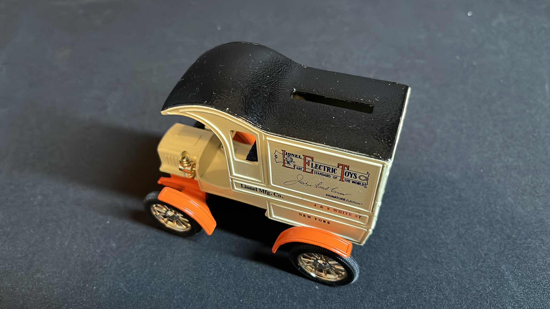 Photo 1 of ERTL COMPANY EASTWOOD AUTOMOBILIA LIONEL ELECTRIC TRAINS DIE-CAST METAL SIGNATURE EDITION 1905 FORD DELIVERY TRUCK BANK W KEY & 1950 CHEVY TRACTOR TRAILER W COA, 1994 (STOCK #B557)