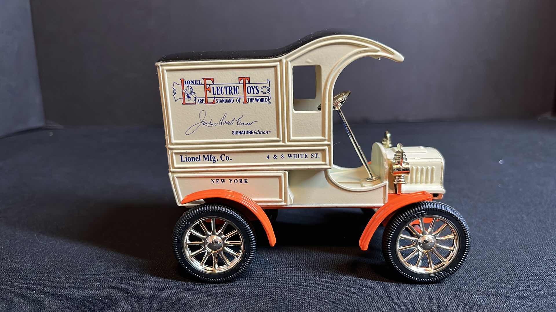Photo 1 of ERTL COMPANY EASTWOOD AUTOMOBILIA LIONEL ELECTRIC TRAINS DIE-CAST METAL SIGNATURE EDITION 1905 FORD DELIVERY TRUCK BANK W KEY & 1950 CHEVY TRACTOR TRAILER W COA, 1994 (STOCK #B557)