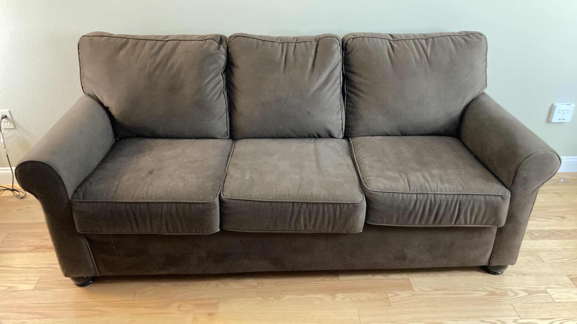 Photo 2 of UNITED FURNITURE EXPRESSO SOFA W PULL OUT BED & THROW PILLOWS 83” X 37” H38”