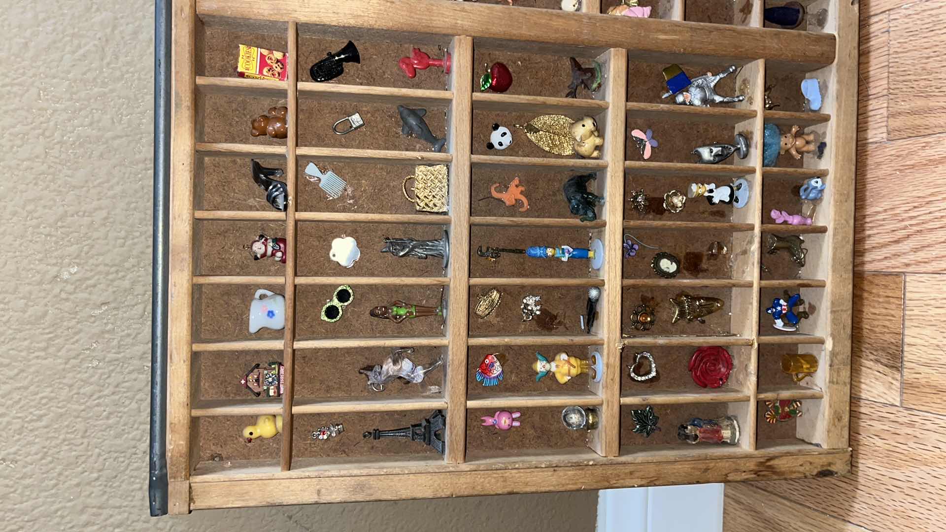 Photo 1 of SHADOW BOX W MINIATURE TRINKETS & PINS 32” X 16.5”