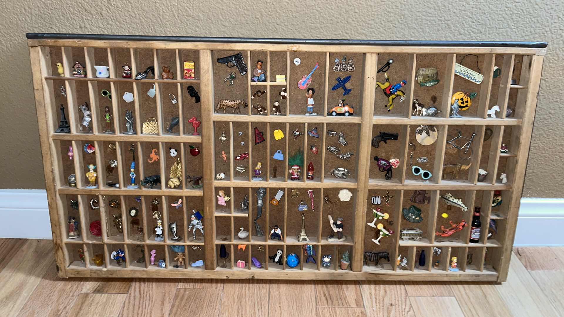 Photo 1 of SHADOW BOX W MINIATURE TRINKETS & PINS 32” X 16.5”