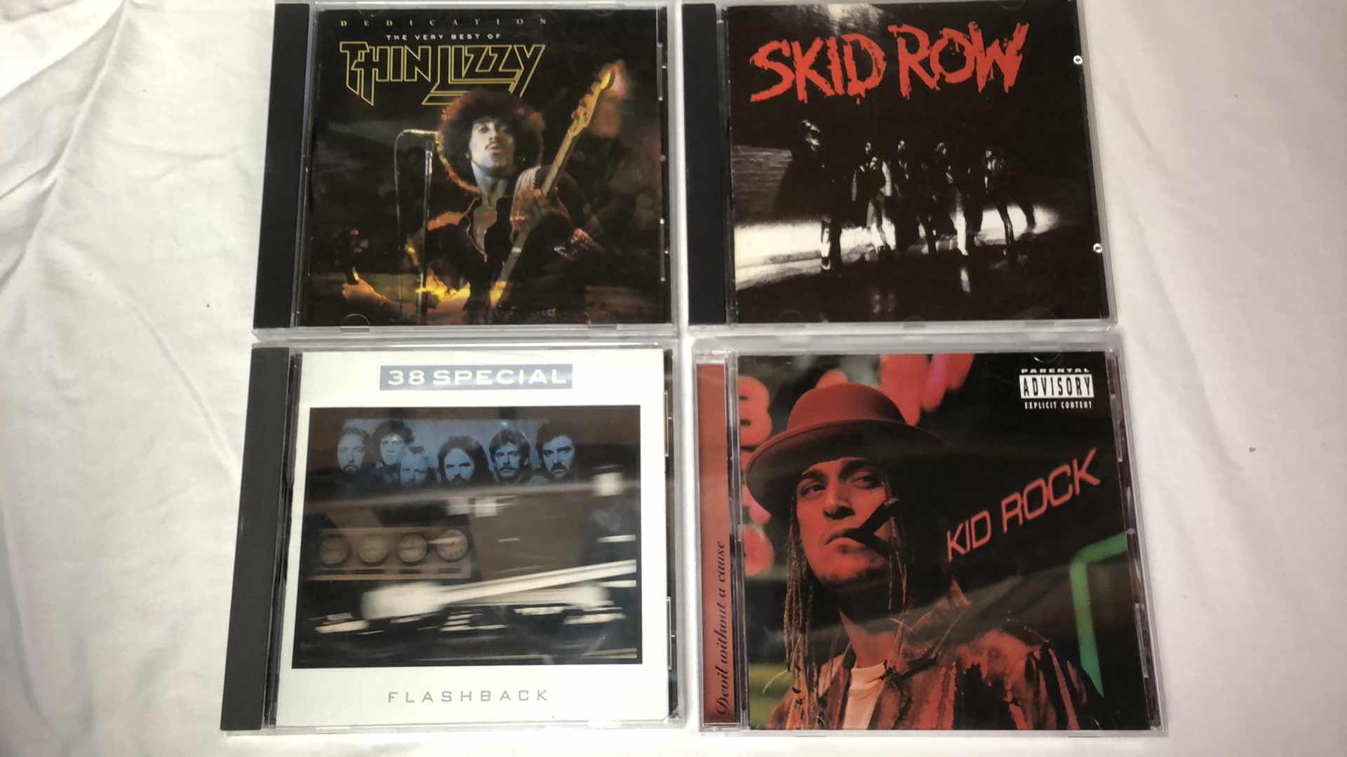 Photo 1 of ASSORTED ROCK ALBUMS (7) (KID ROCK, 38 SPECIAL, TRIUMPH ETC)