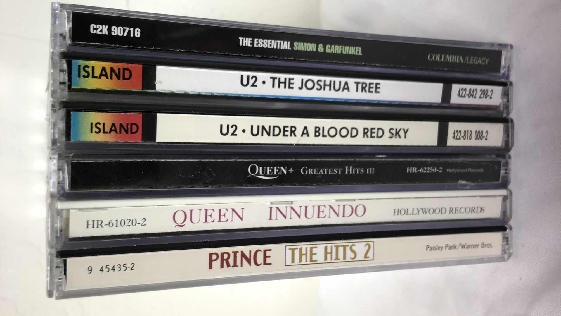 Photo 1 of ASSORTED MUSIC ALBUMS (6) PRINCE, QUEEN, U2, SIMON & GARFUNKEL