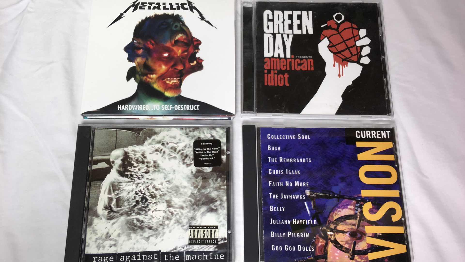 Photo 1 of ASSORTED ROCK MUSIC CDS (5) GUN N ROSES METALLICA GREEN DAY ETC