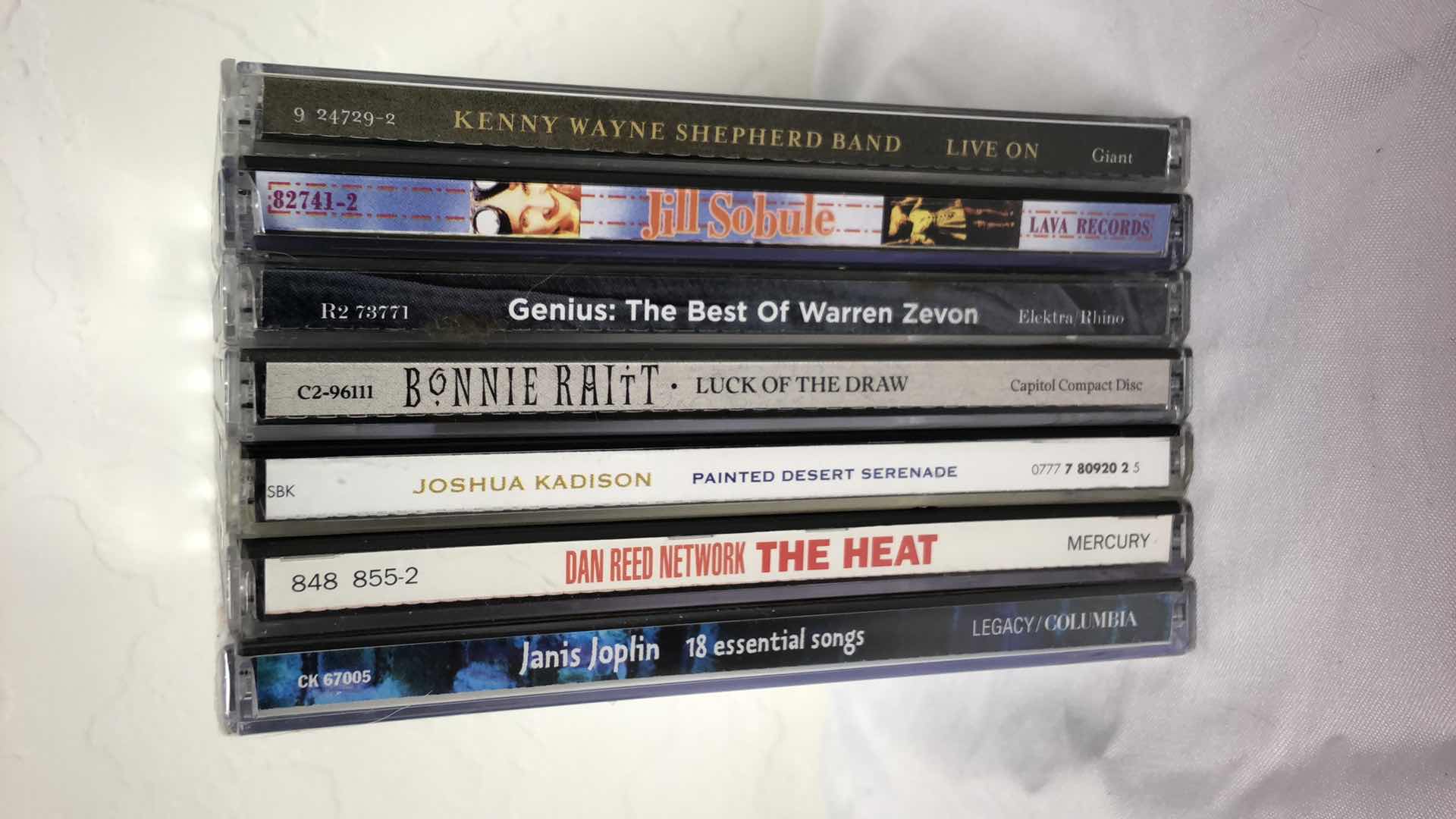 Photo 1 of ASSORTED MUSIC CDS (7) JANIS JOPLIN, JOSHUA KADISON, WARREN ZEVON, ETC