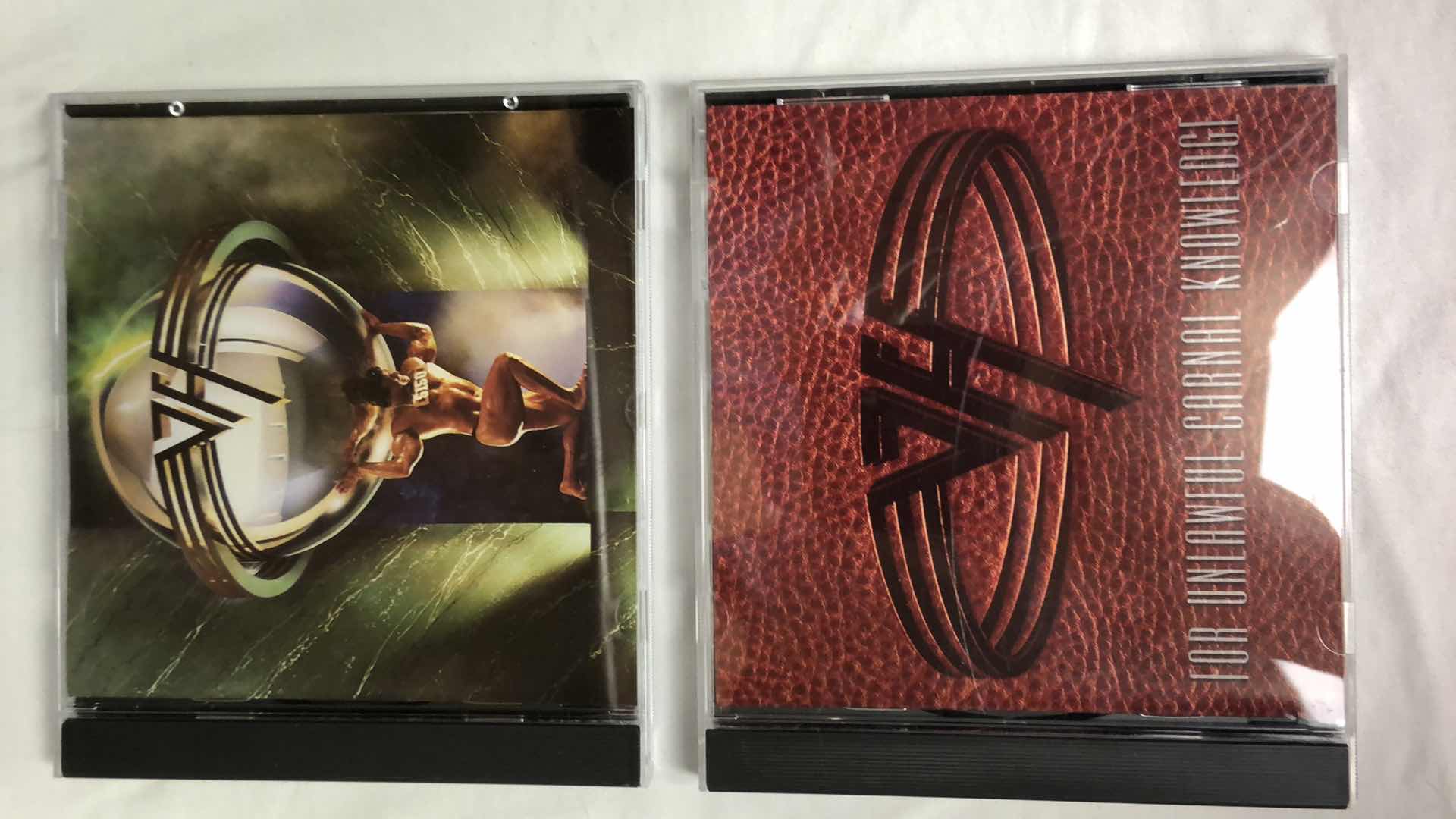 Photo 1 of ASSORTED VAN HALEN ALBUM CDS (4)