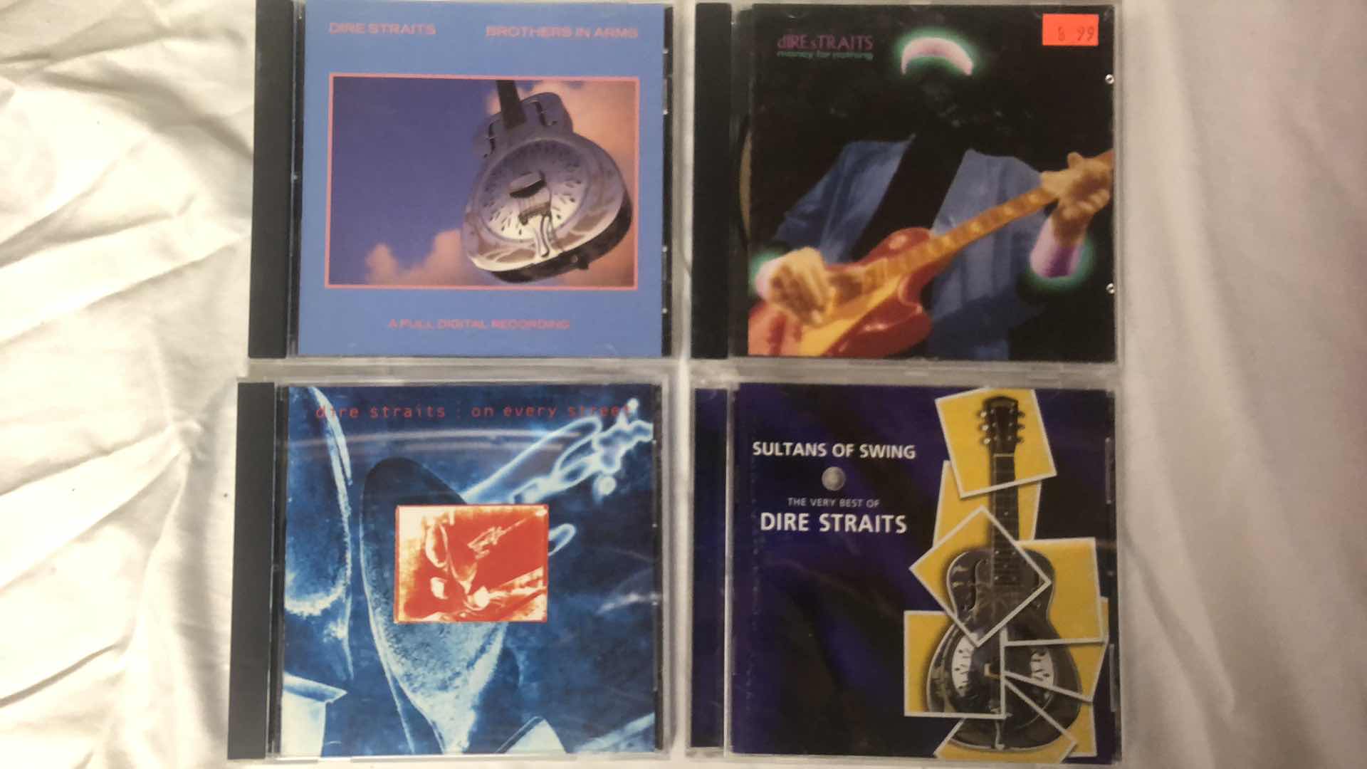 Photo 1 of ASSORTMENT OF DIRE STRAIGHTS ALBUM CDS (8)