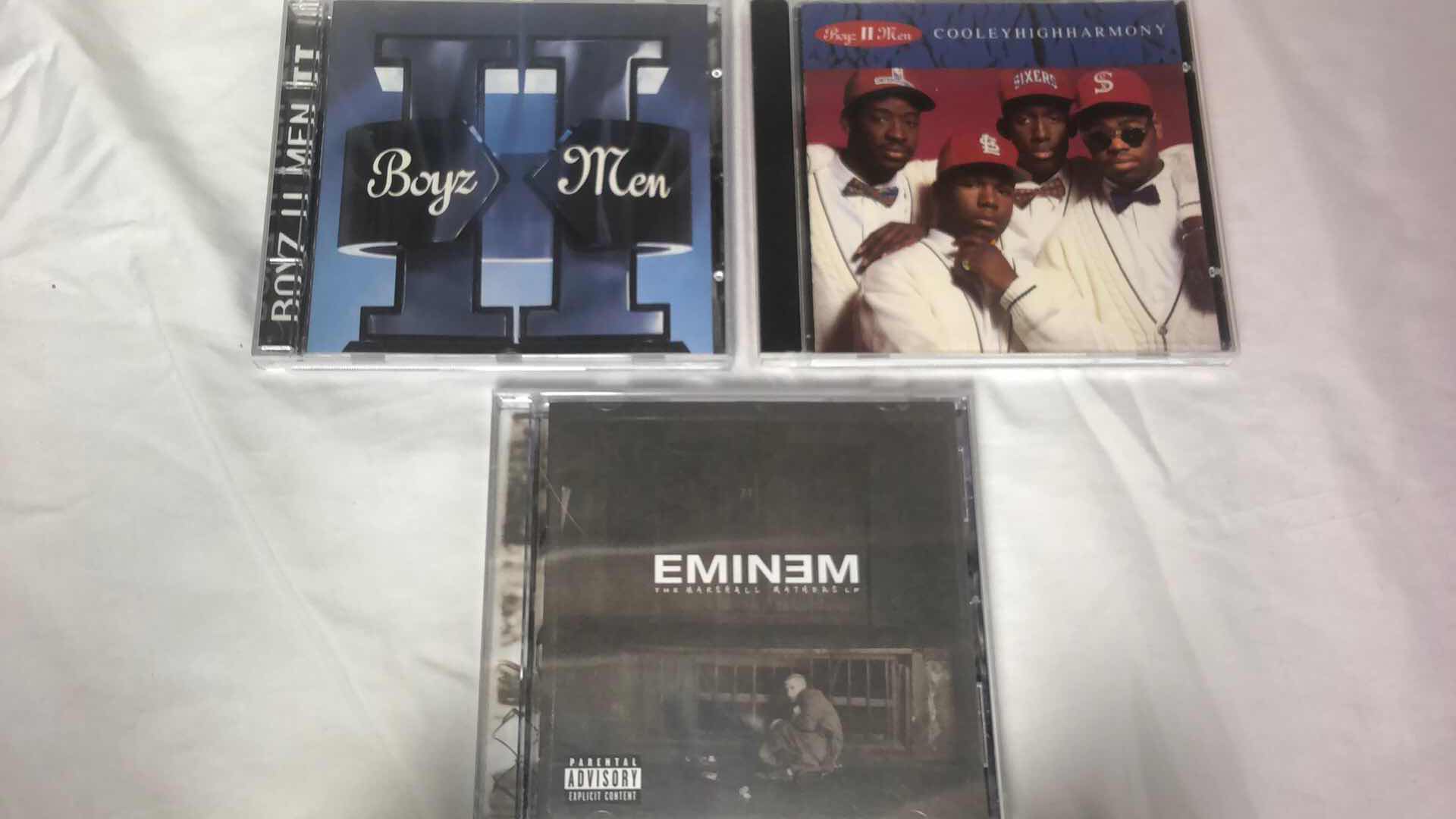 Photo 1 of ASSORTED R&B/RAP ALBUM CDS BOYS II MEN, BEASTIE BOYS, EMINEM, ETC (5)