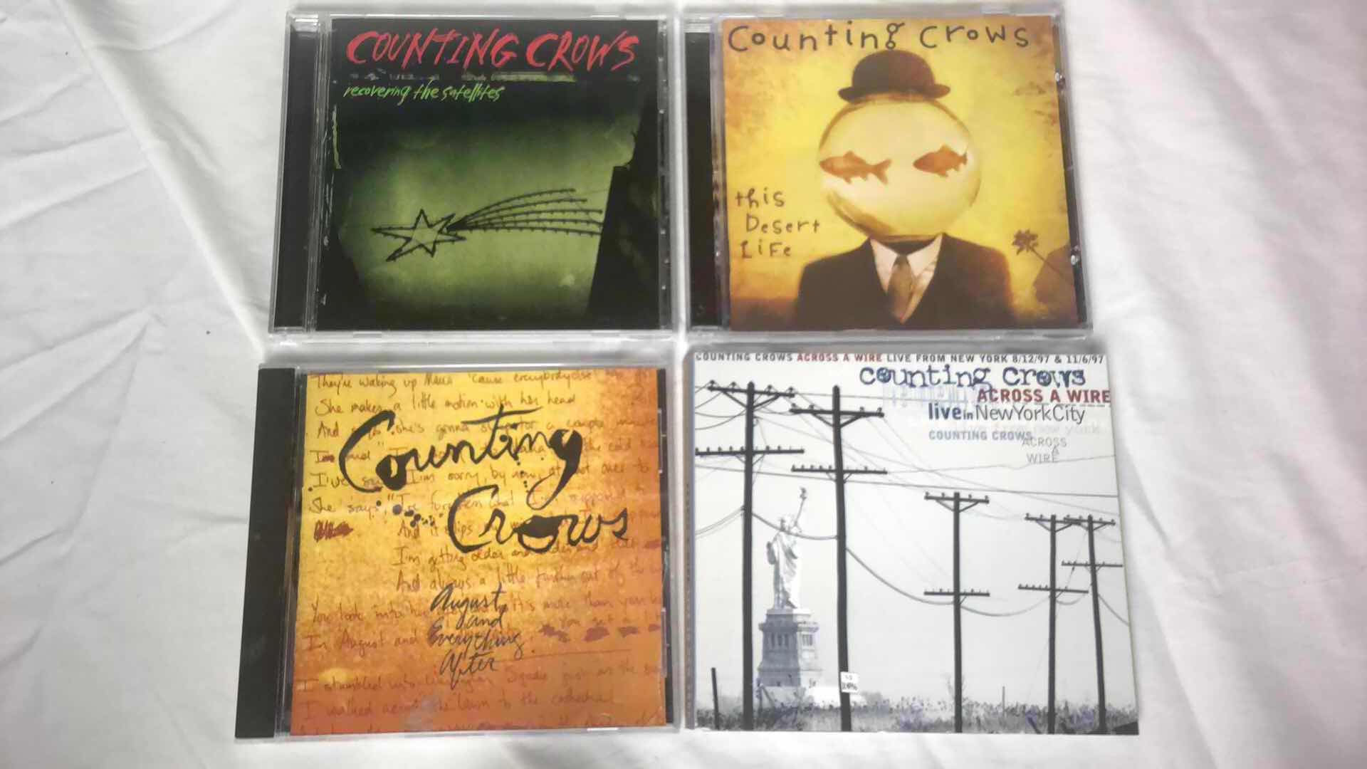 Photo 1 of ASSORTED COUNTING CROWS ALBUM CDS (4)