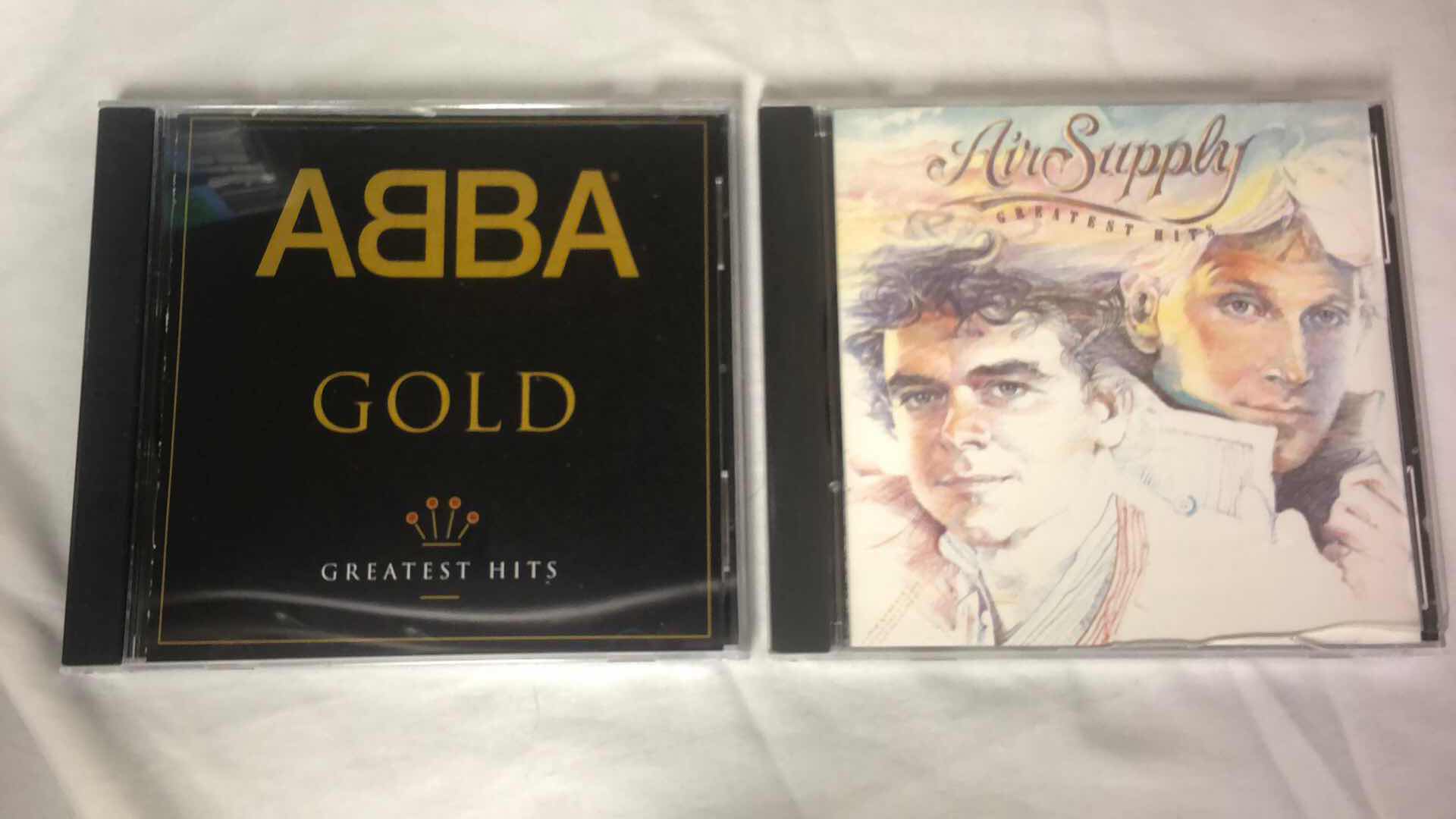 Photo 1 of ASSORTED SOFT ROCK ALBUM CDS ABBA, REM, AIR SUPPLY, ETC (5)