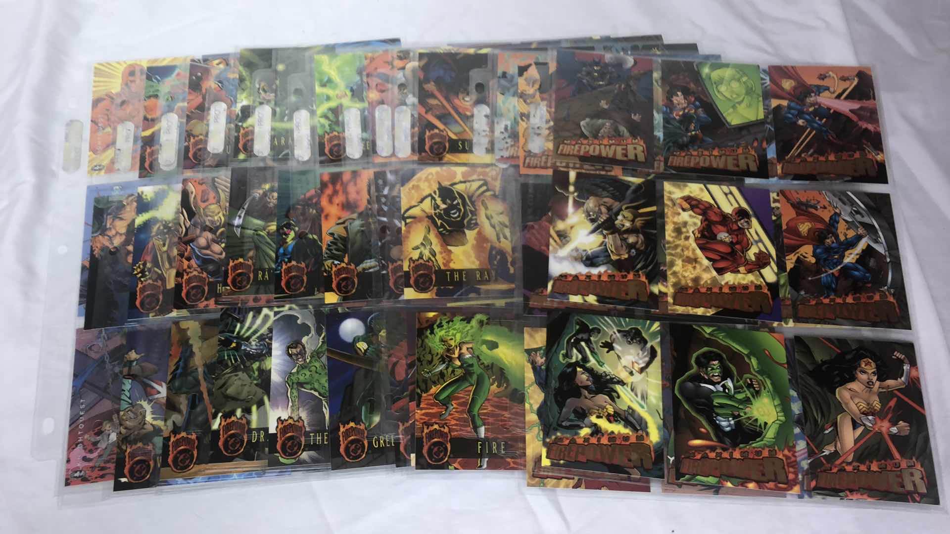 Photo 1 of APPROX 95 MAXIMUM FIREPOWER DC HEROES TRADING CARDS NEAR COMPLETE SET IN SLEEVES NEAR PERFECT CONDITION