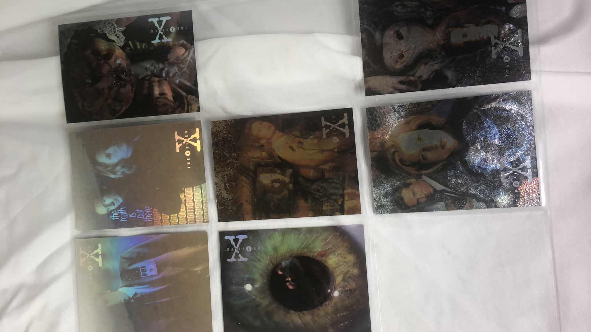 Photo 1 of APPROX 90 TOPPS THE X FILES TRADING CARDS NEAR COMPLETE SET IN SLEEVES NEAR PERFECT CONDITION