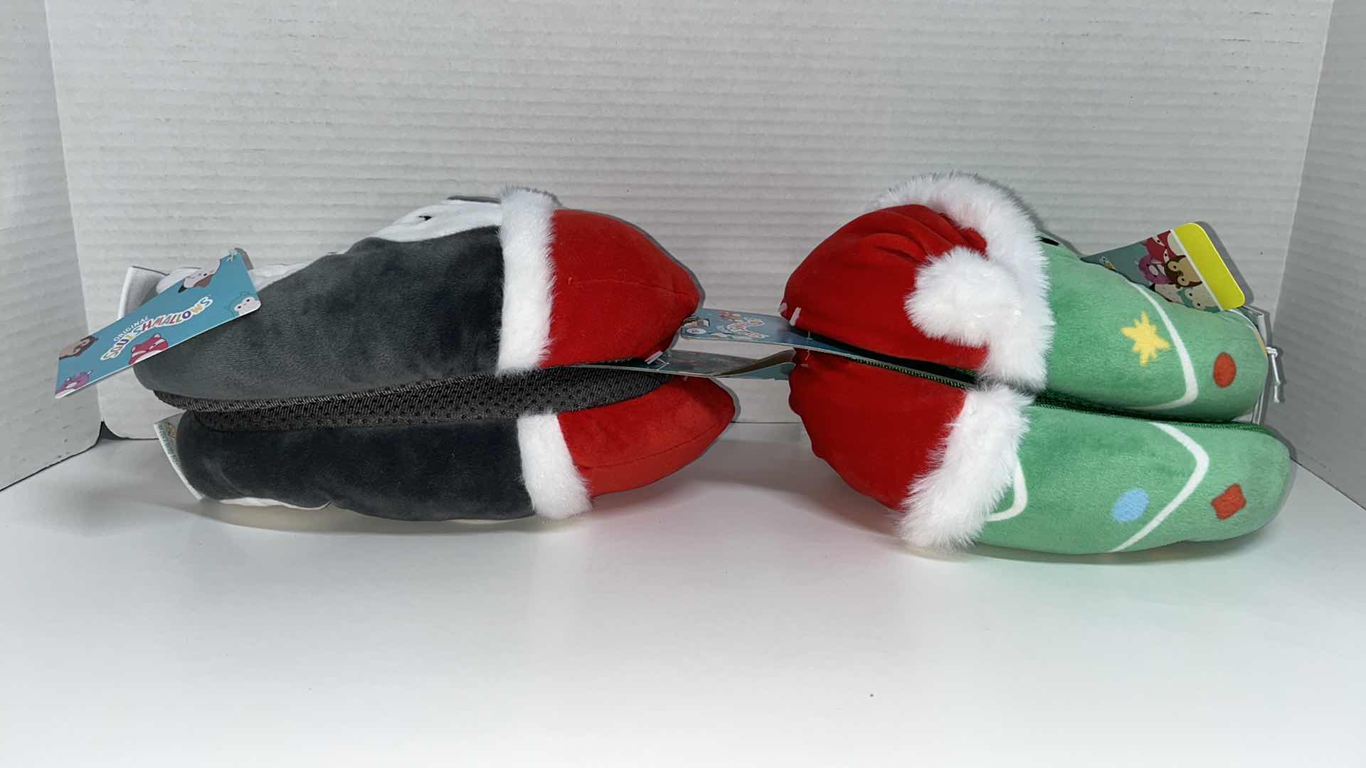 Photo 1 of KELLYTOY SQUISHMALLOWS PLUSH KIDS SLIPPERS, PENGUIN/CHRISTMAS TREE SIZE 13-1 (2)