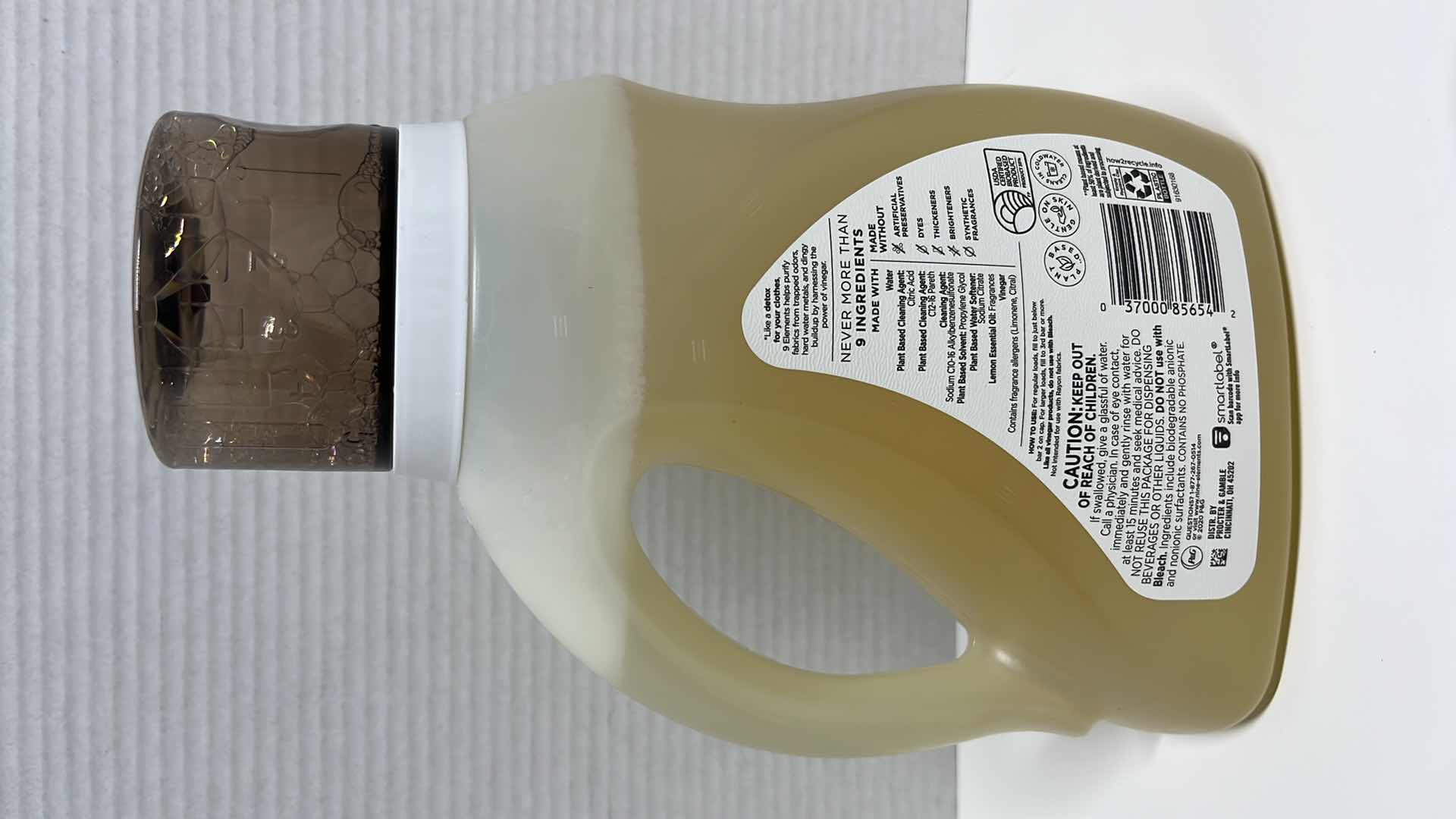 Photo 1 of NEW 9 ELEMENTS LEMON SCENTED LAUNDRY DETERGENT, 46 OZ (CASE OF 6)