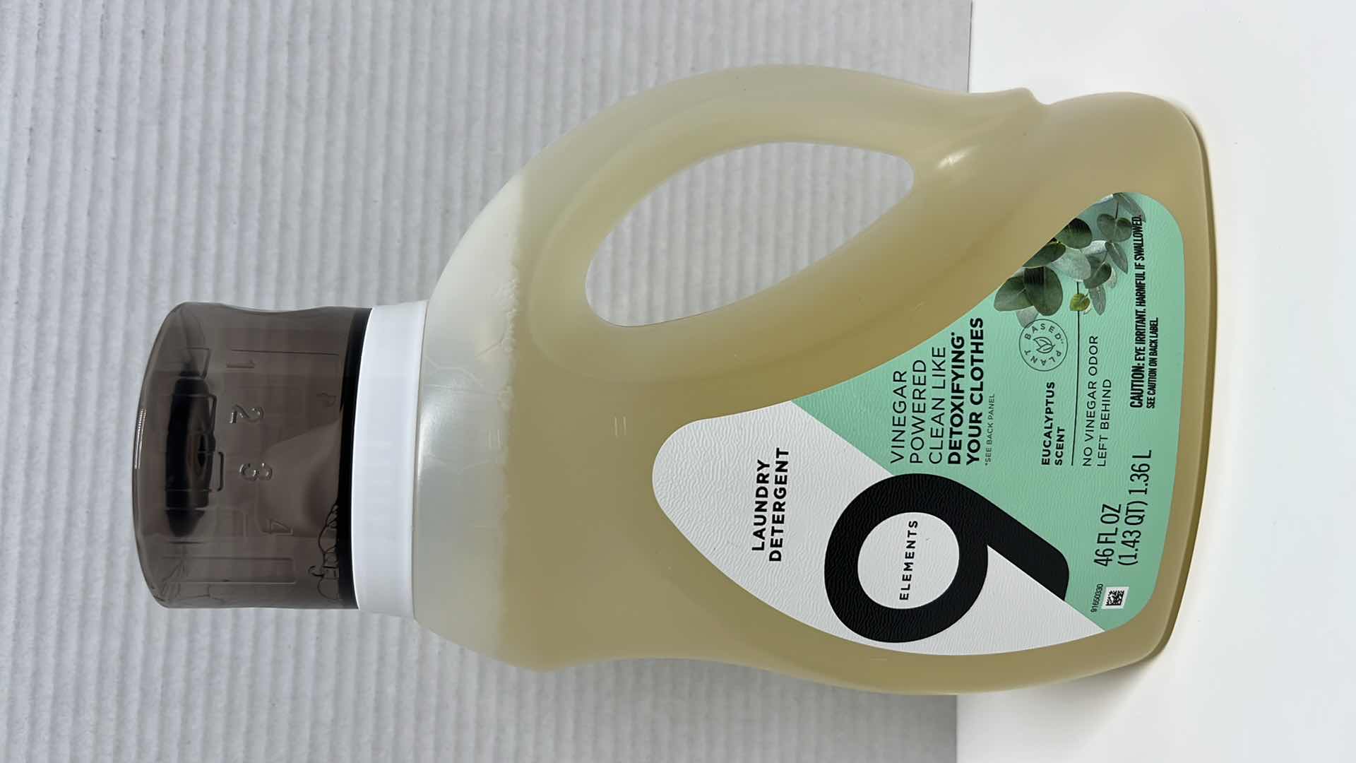 Photo 1 of NEW 9 ELEMENTS EUCALYPTUS SCENTED LAUNDRY DETERGENT, 46 OZ (CASE OF 6)