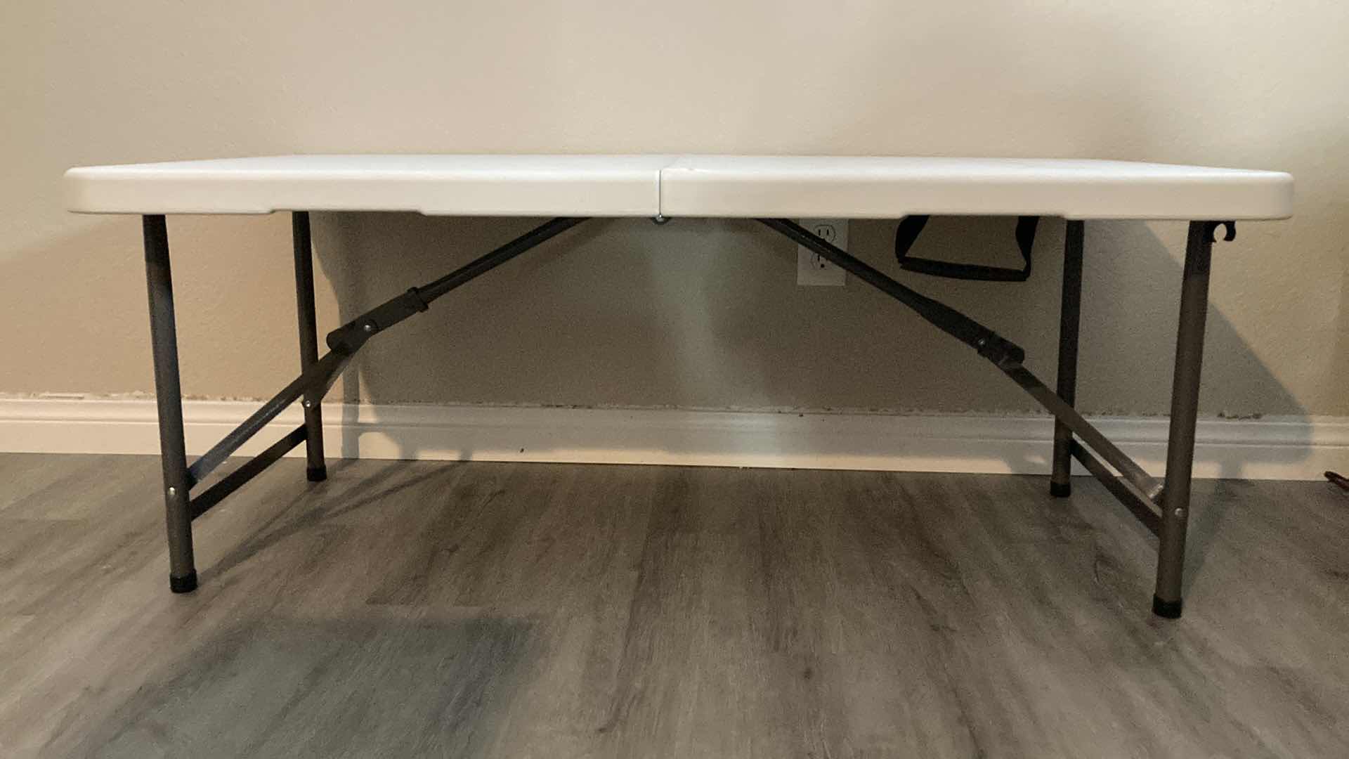 Photo 1 of FOLDING ADJUSTABLE HEIGHT TABLE W LEG EXTENSIONS 48” X 23” H19”-30”