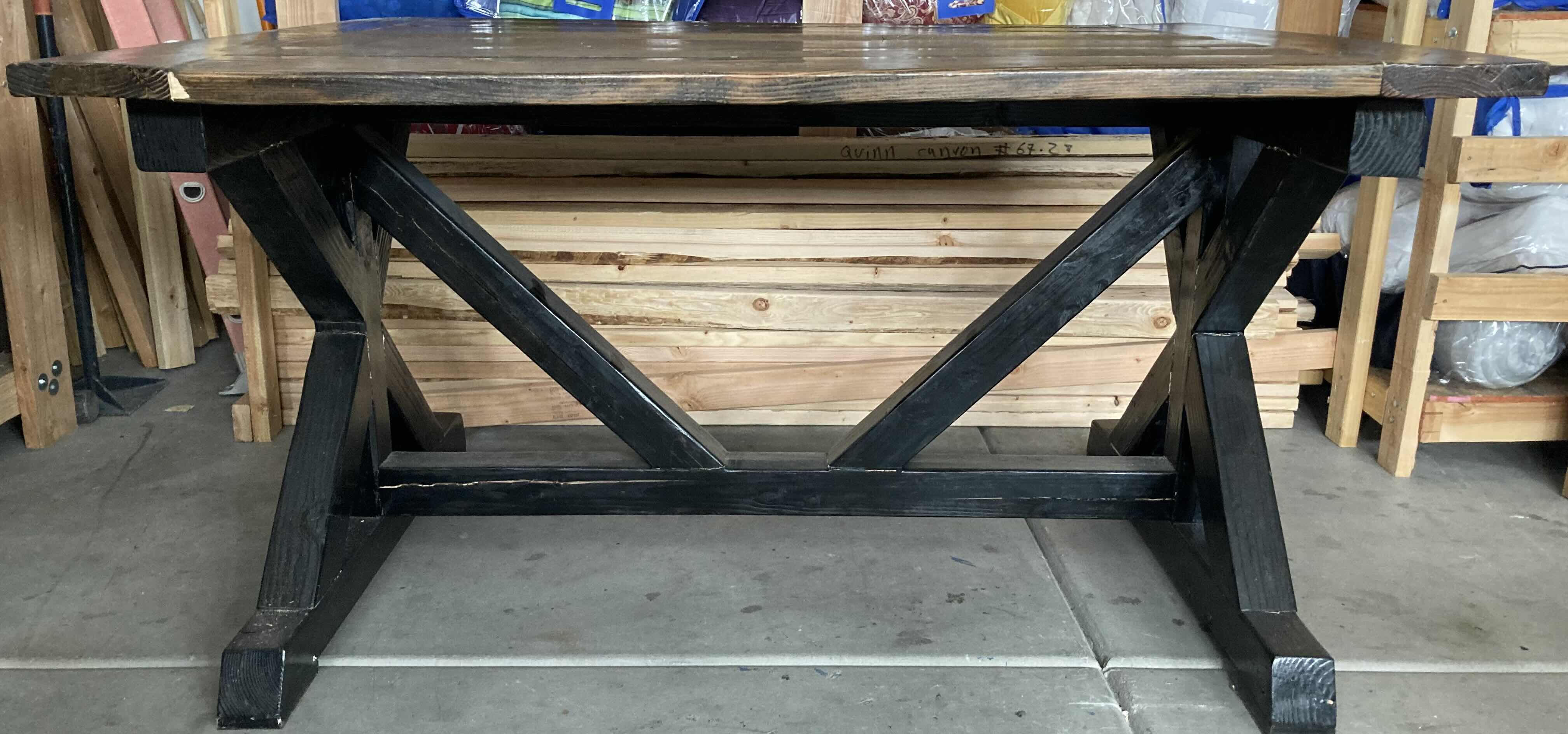 Photo 2 of RUSTIC SOLID DARK WOOD TABLE 65.25” X 50” H36”