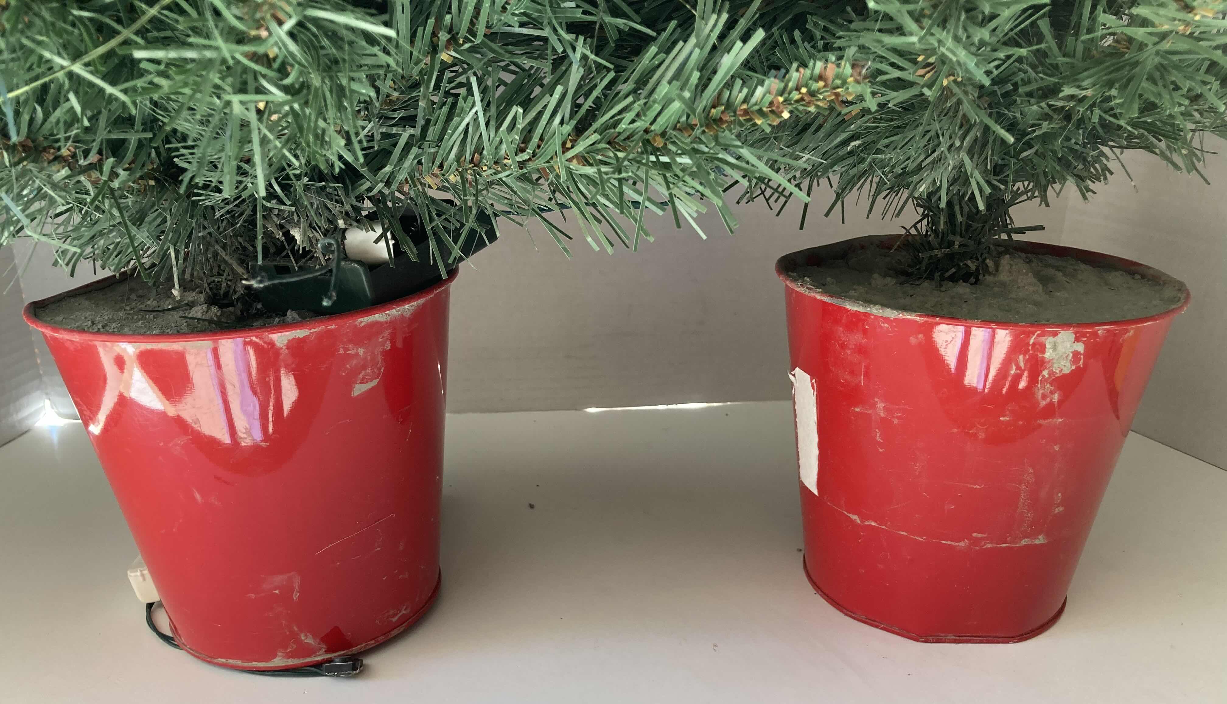 Photo 1 of MINI CHRISTMAS TREES W CEMENTED TIN POT 14” X 26”