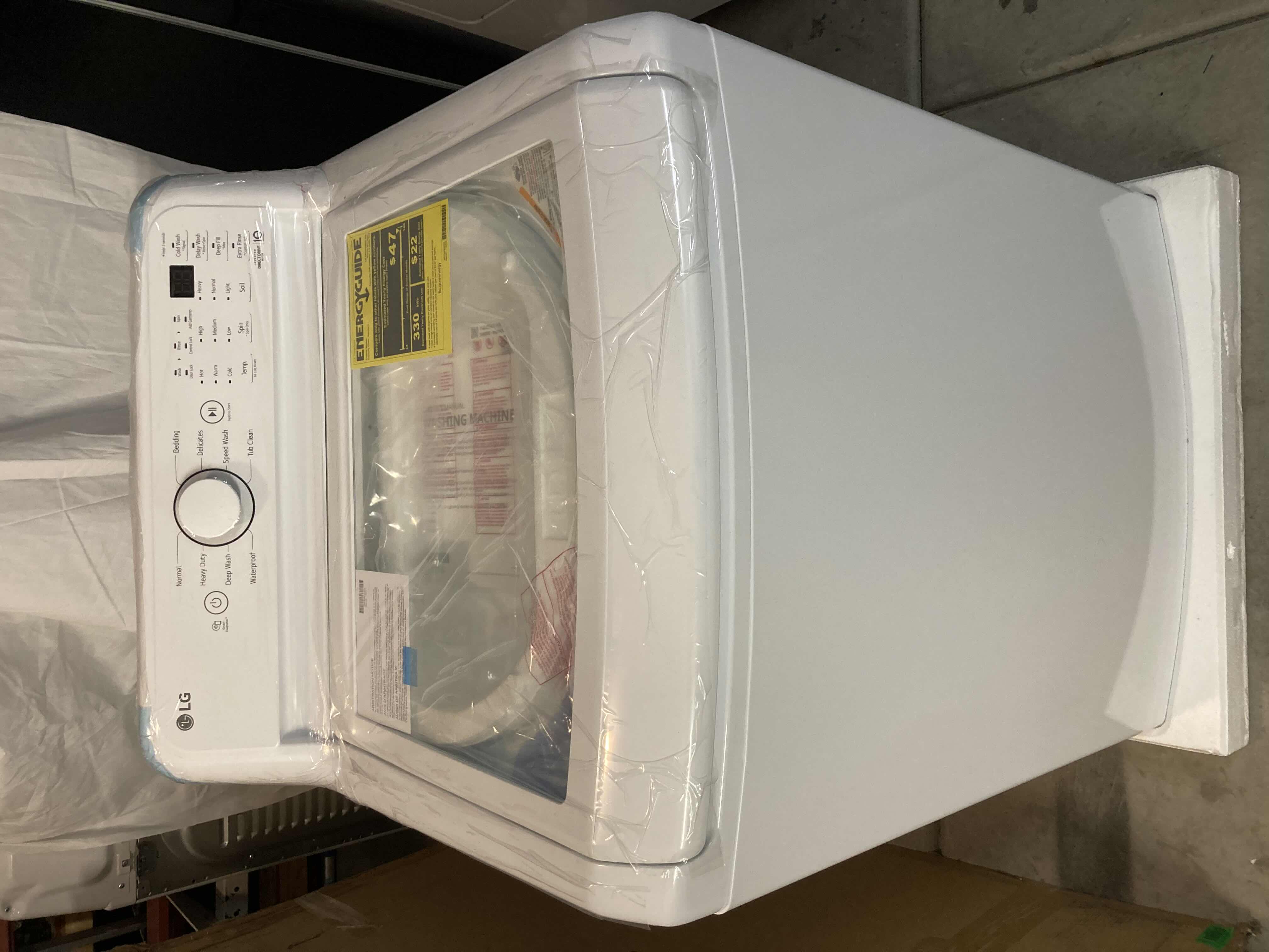 Photo 1 of LG TOP LOAD WASHING MACHINE MODEL WT7005CW