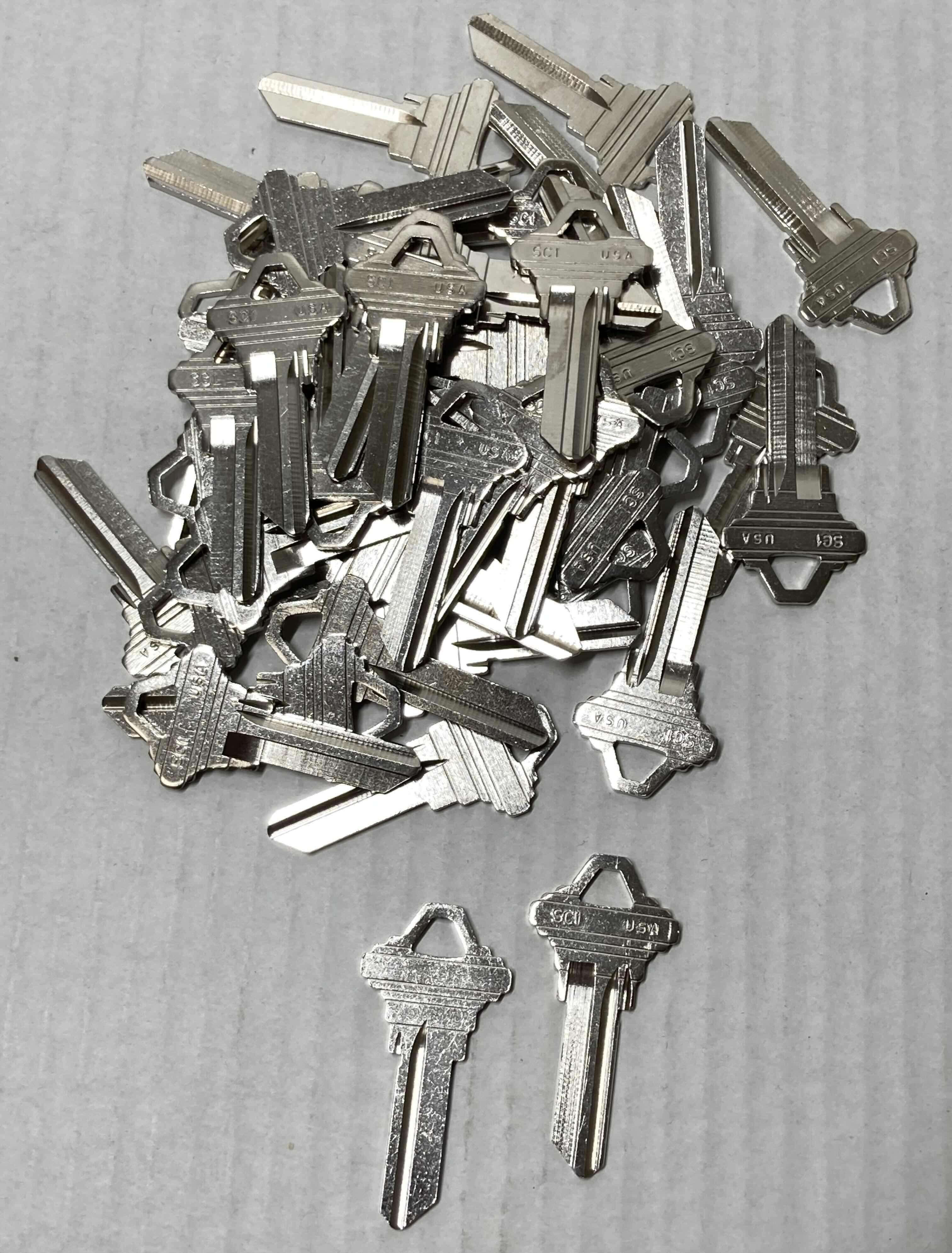 Photo 1 of NEW SC1 BLANK KEYS (50)