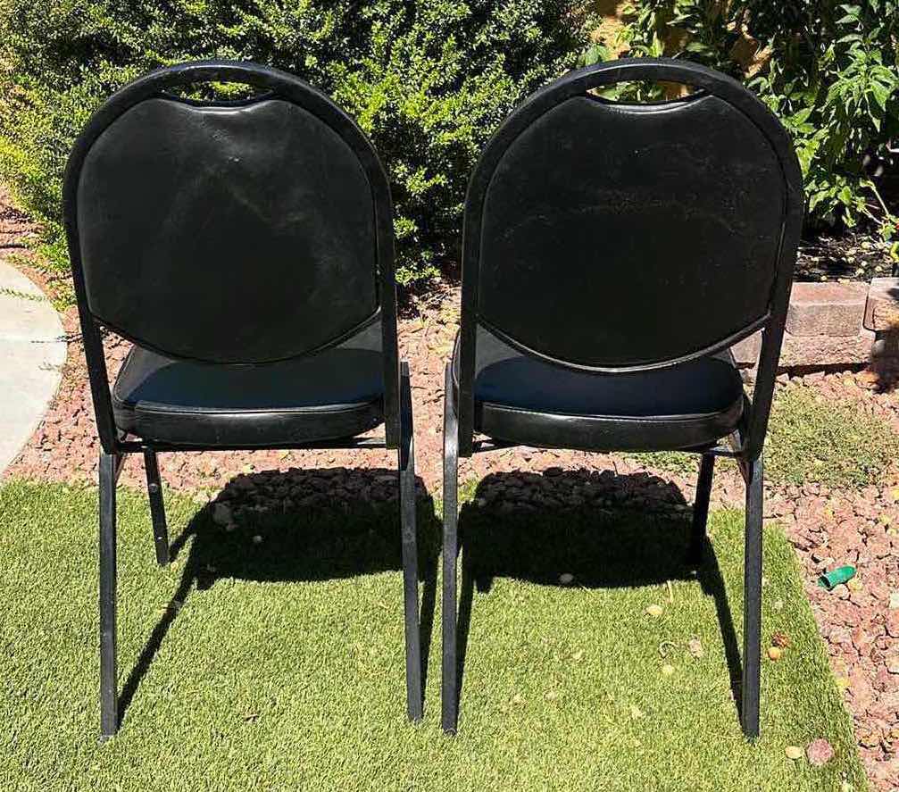 Photo 1 of BLACK PADDED METAL STACKABLE CHAIRS (2) 17.5” X 20” H37.5”