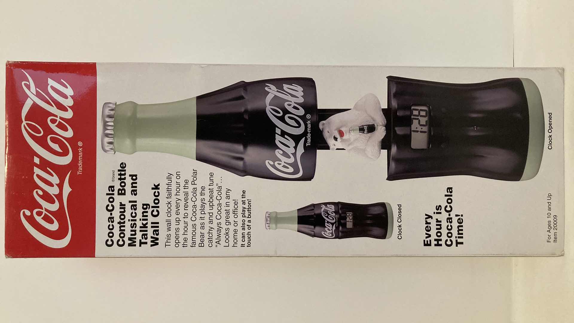 Photo 1 of COCA-COLA COKE CONTOUR BOTTLE MUSICAL & TALKING WALL CLOCK