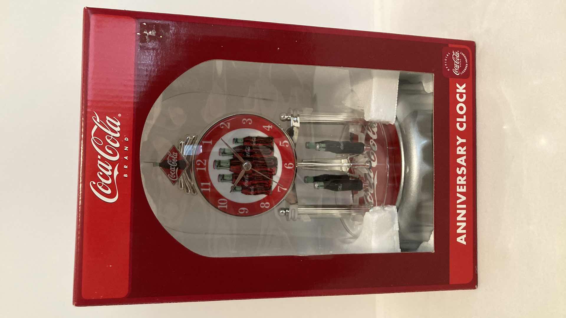 Photo 1 of COCA-COLA ANNIVERSARY GLASS DOME PORCELAIN DIAL CLOCK