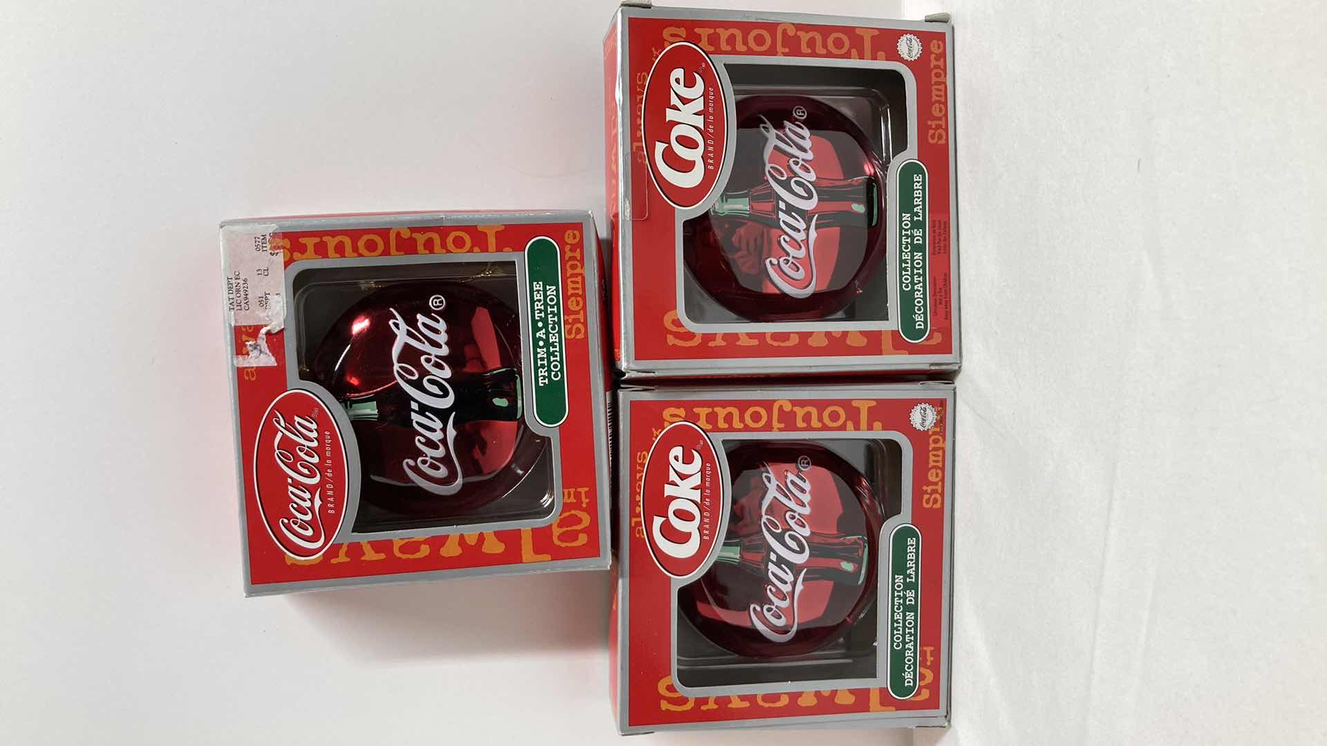 Photo 1 of COCA-COLA TRIM A TREE COLLECTION HOLOGRAPHIC ORNAMENTS (3)