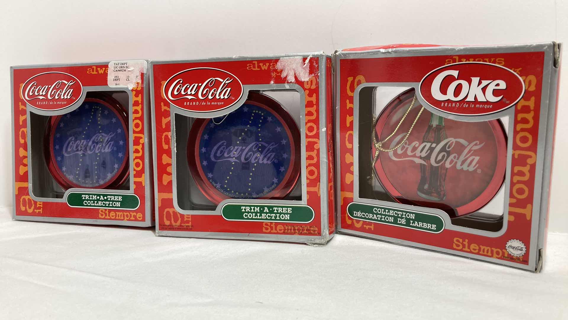 Photo 1 of COCA-COLA TRIM A TREE COLLECTION HOLOGRAPHIC ORNAMENTS (3)