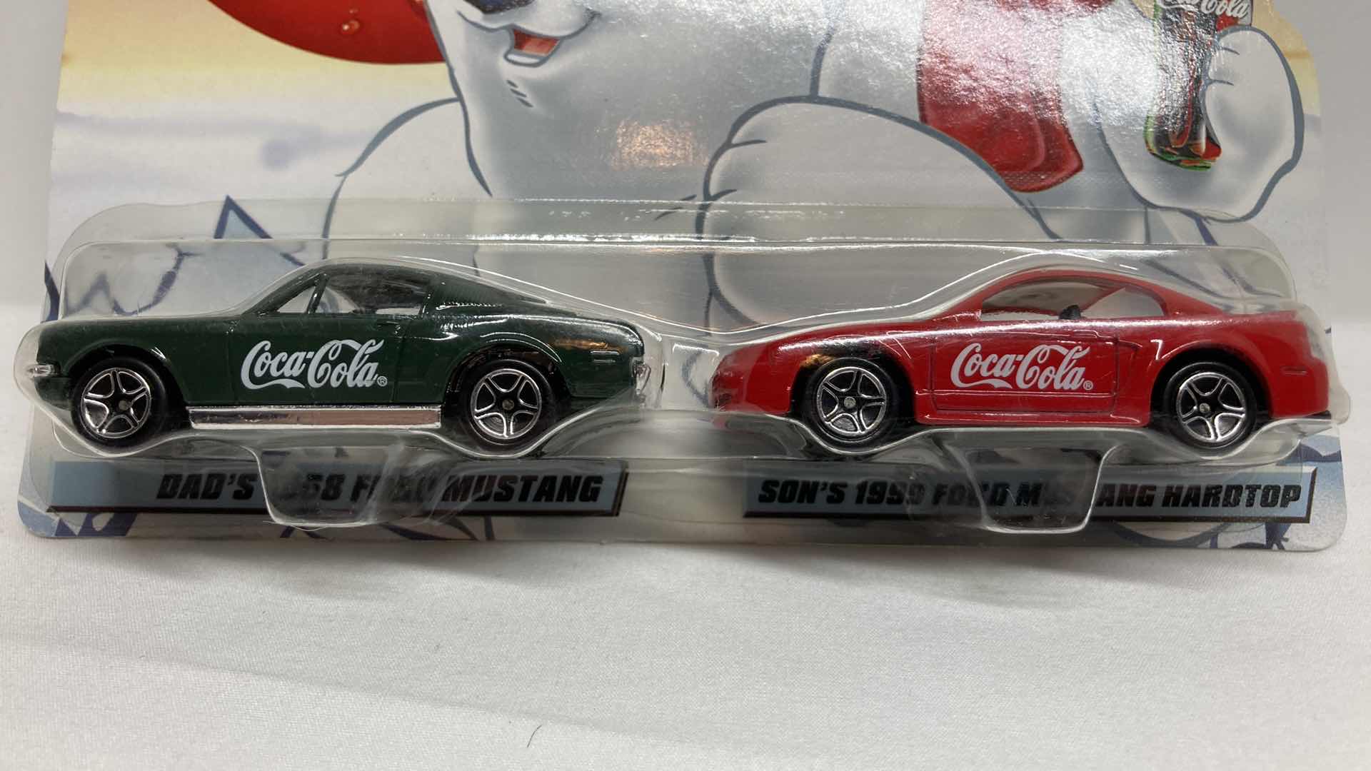 Photo 1 of MATCHBOX COCA-COLA DADS 1968 FORD MUSTANG & SONS 1999 FORD MUSTANG HARDTOP CARS