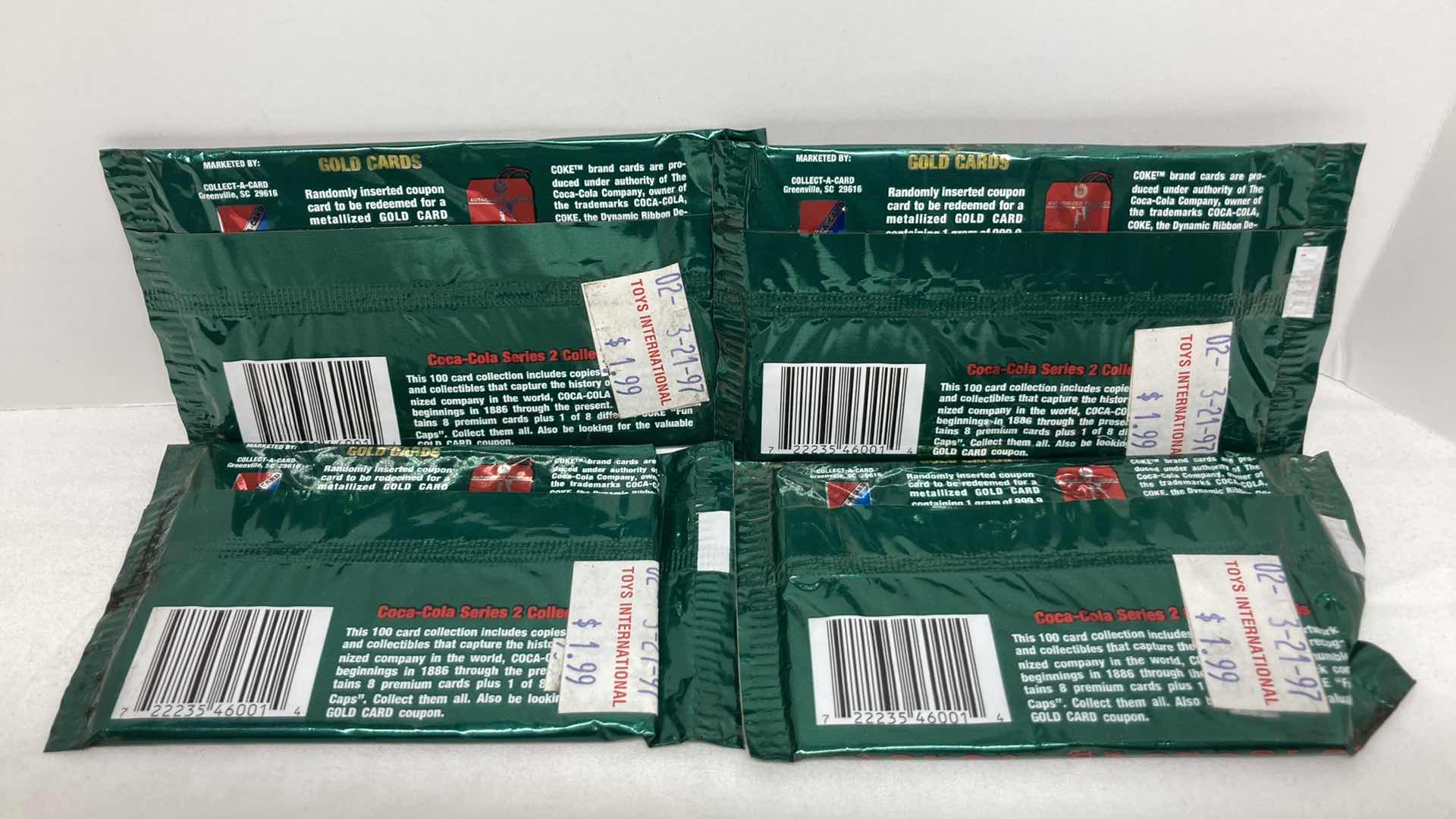 Photo 1 of COCA-COLA SERIES 2 SEARCH FOR GOLD PREMIUM COLLECTOR CARDS (4) SEALED