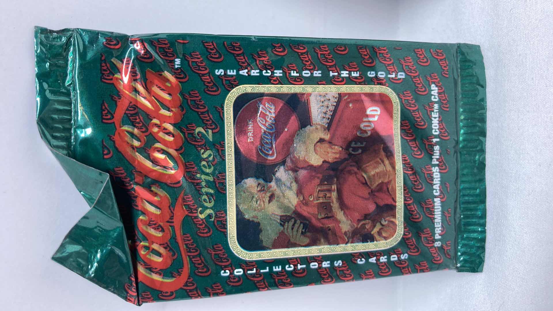 Photo 1 of COCA-COLA SERIES 2 SEARCH FOR GOLD PREMIUM COLLECTOR CARDS (4) SEALED