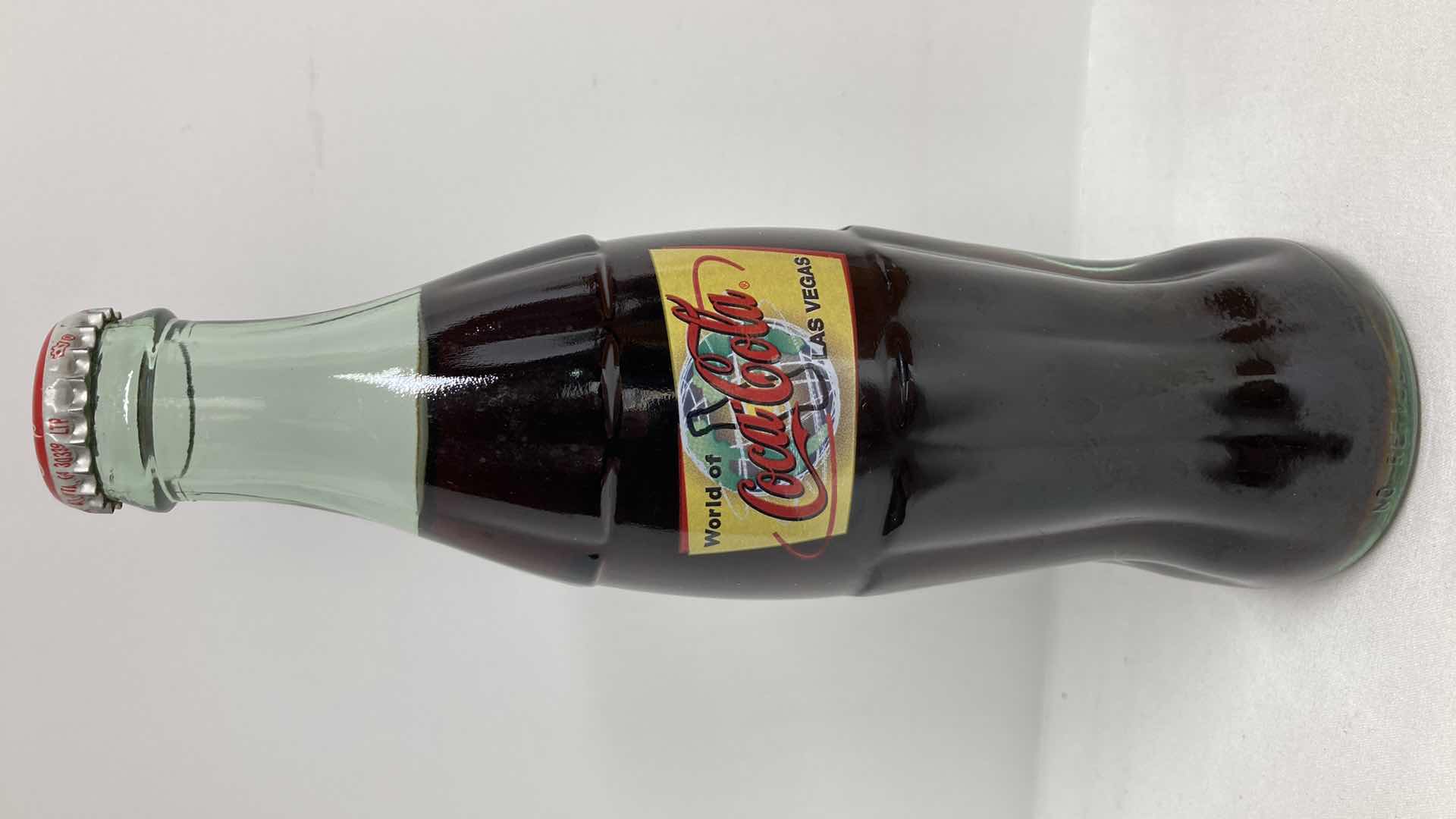 Photo 7 of COCA-COLA WORLD COCA-COLA LAS VEGAS GLASS SEALED BOTTLES (6) W WOOD CARRIER