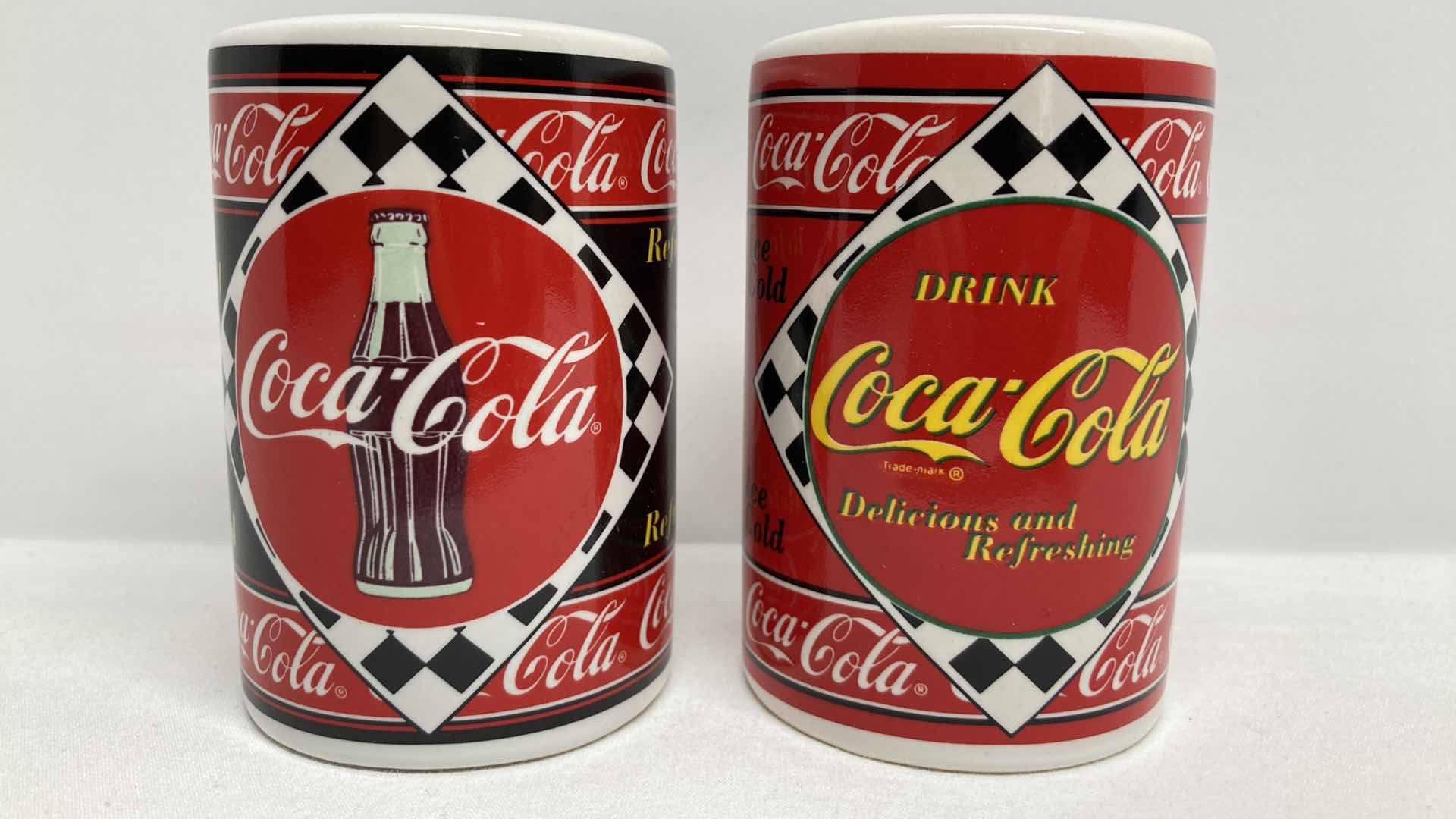Photo 3 of COCA-COLA SALT & PEPPER SHAKERS 2.25” X 3.25”