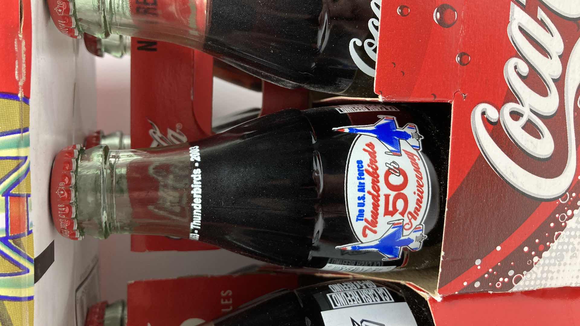 Photo 1 of COCA-COLA SPECIAL EDITION 6 PACK SEALED GLASS BOTTLES & CASES (5)