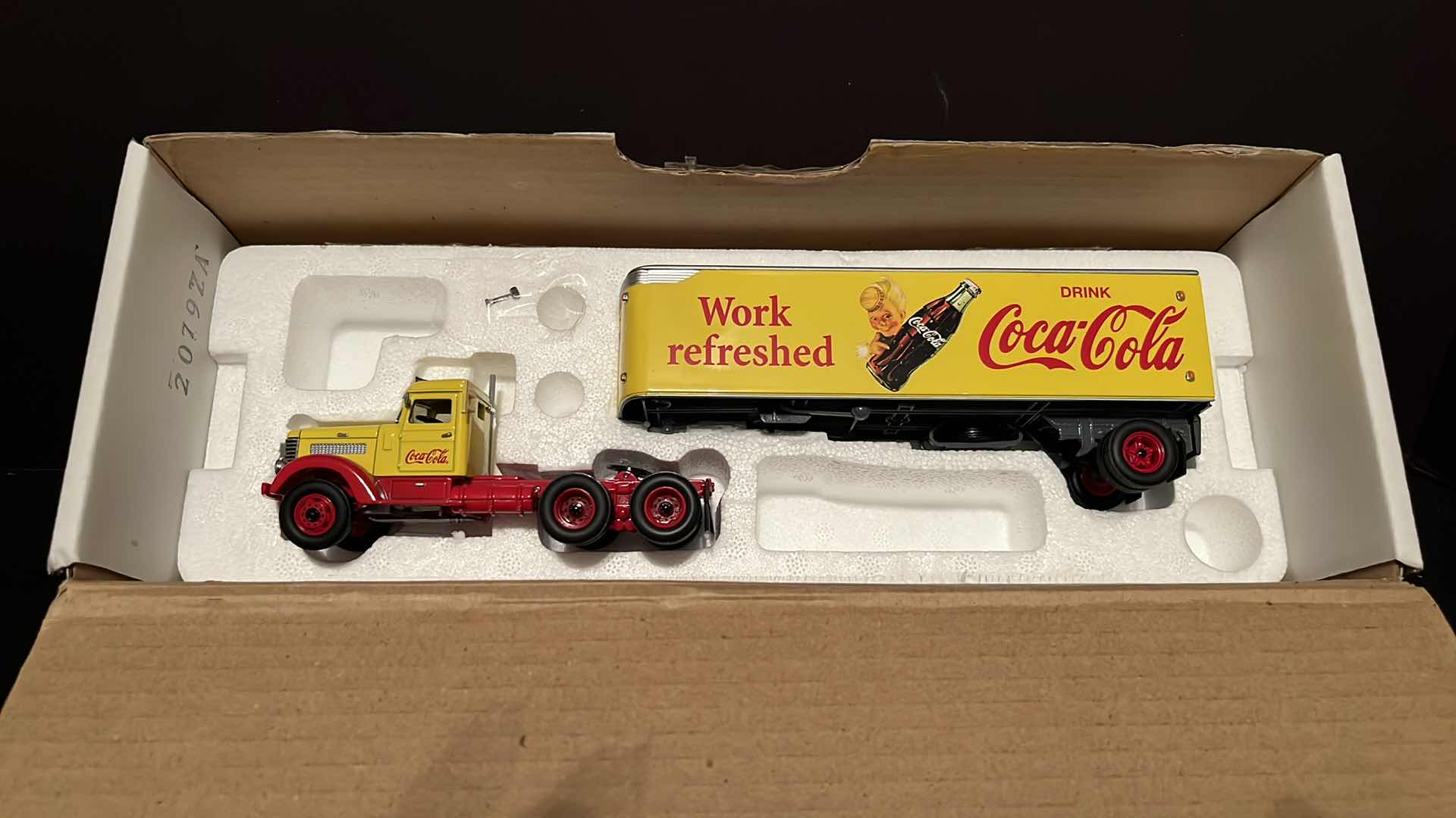 Photo 1 of COCA-COLA MATCHBOX COLLECTIBLES DINKY 1939 PETERBILT TRACTOR TRAILER, W COA, 1995 (MODEL DYM38050)